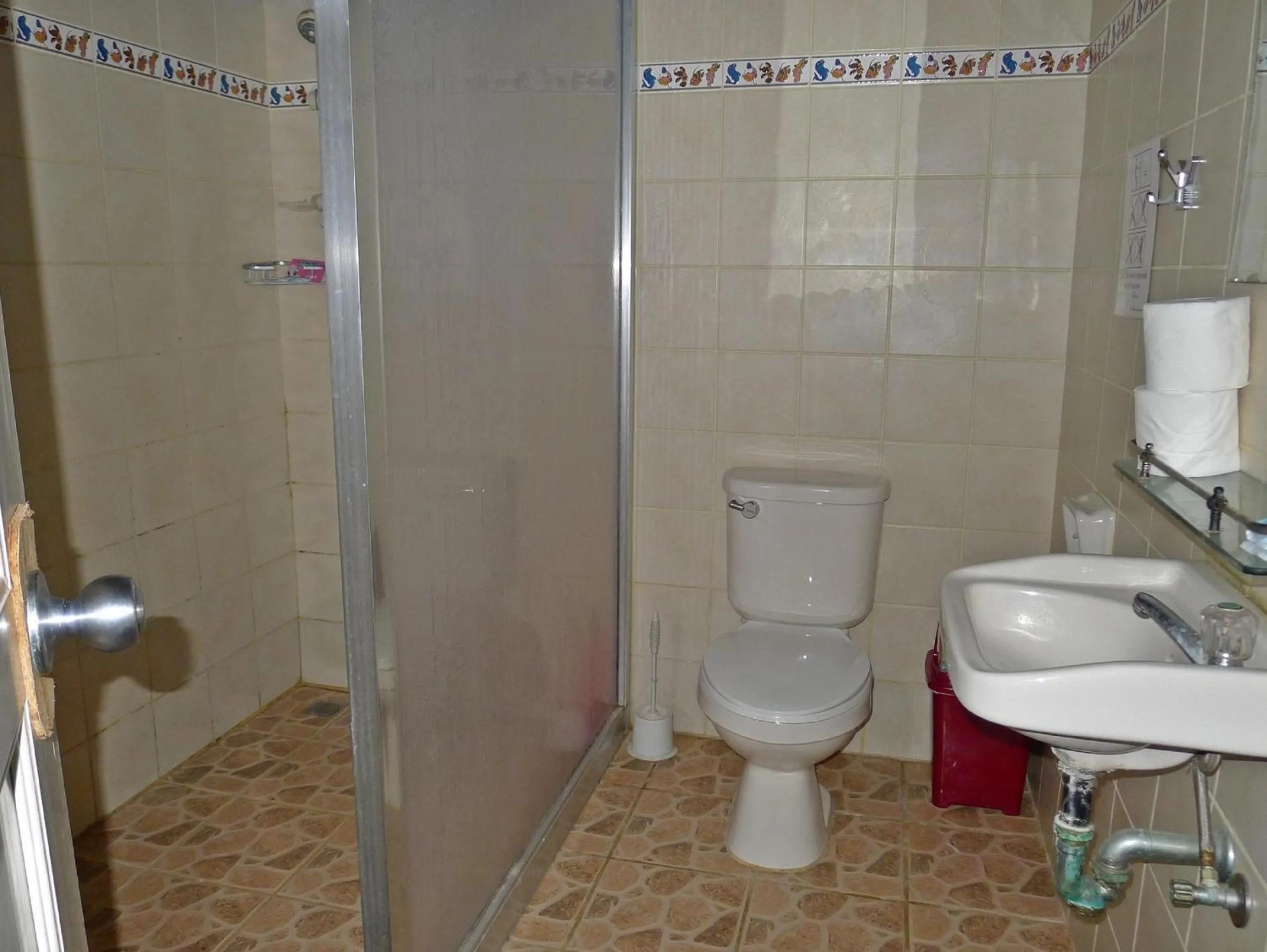 Bathroom in La Salangane Caalan Beach Villa