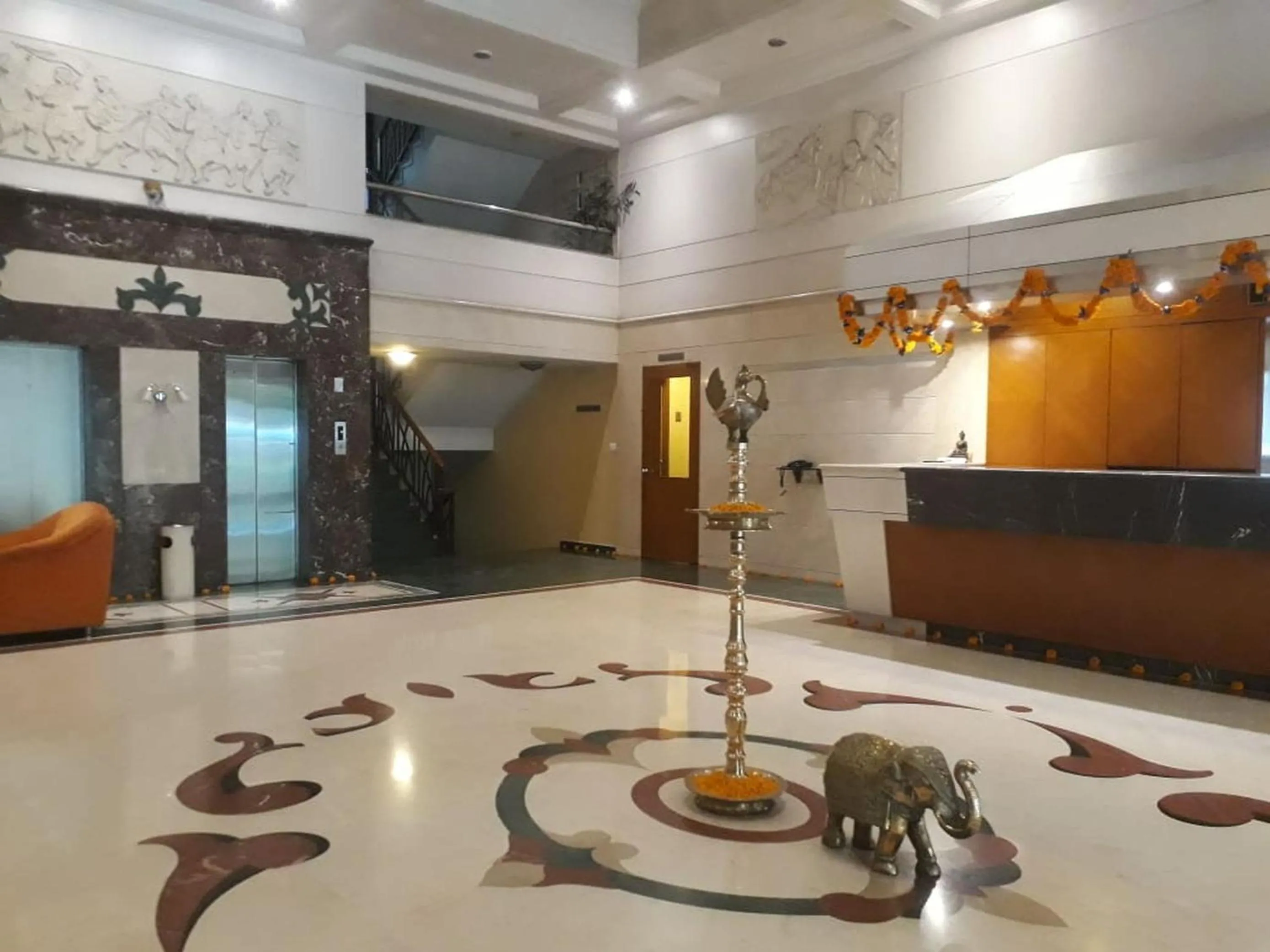 Lobby or reception in The Samrat Hotel near Pune Railway Station
