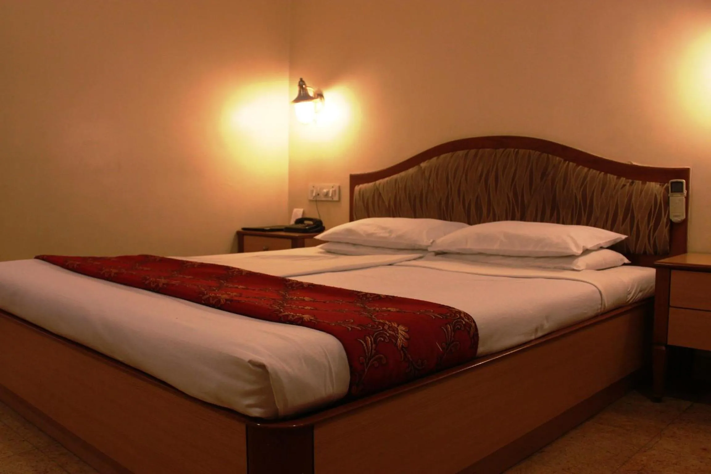 Bedroom, Bed in The Samrat Hotel near Pune Railway Station