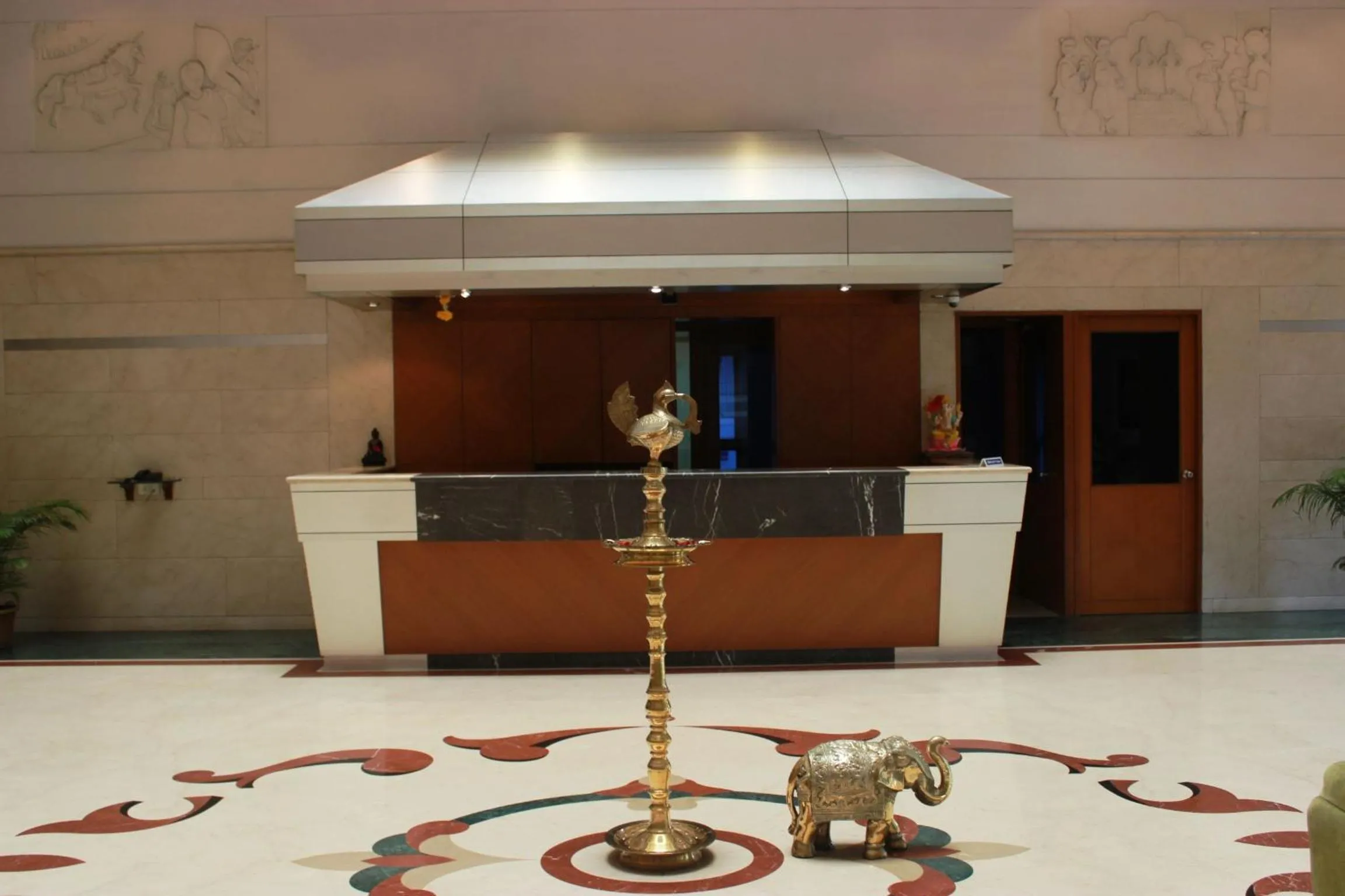 Lobby or reception in The Samrat Hotel near Pune Railway Station