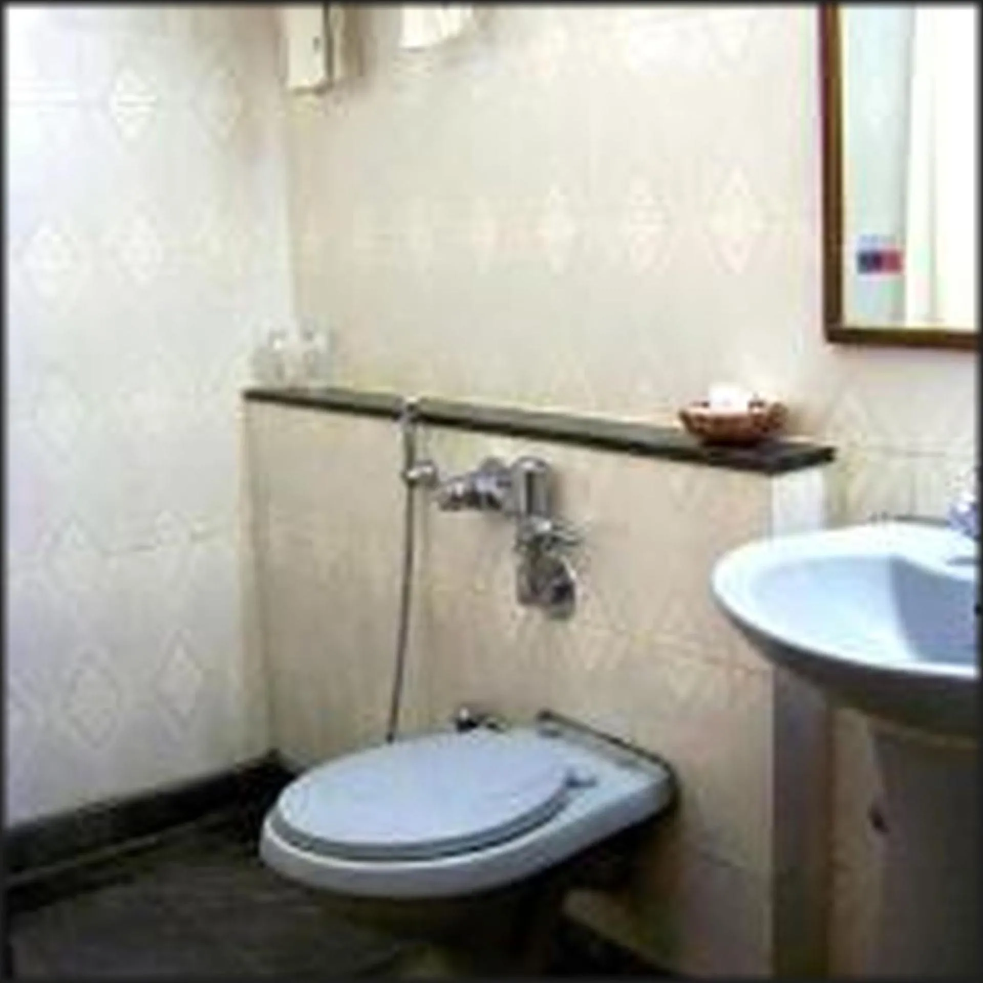 Bathroom in The Samrat Hotel near Pune Railway Station