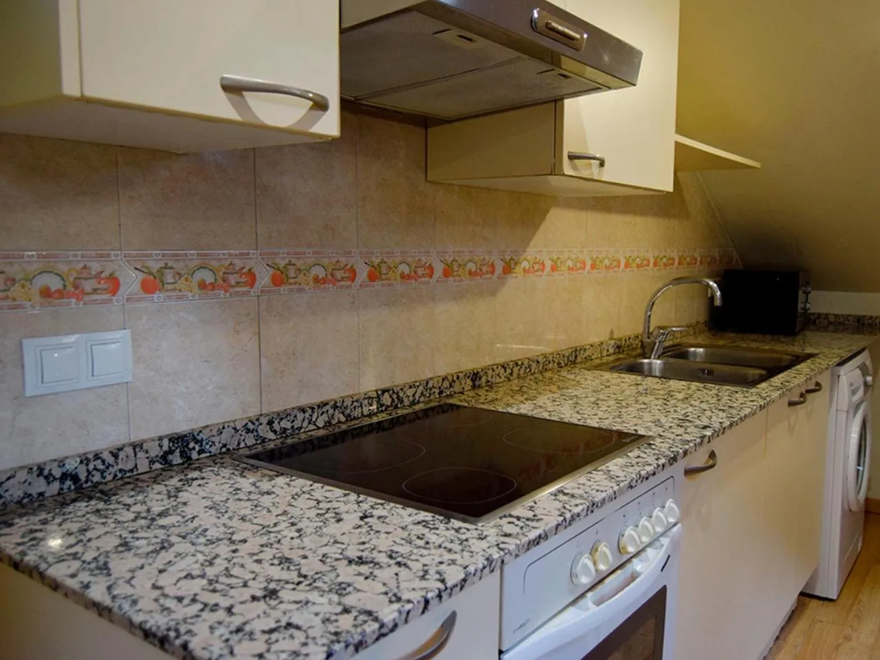 Kitchen or kitchenette in Apartamentos Pantebre 3000