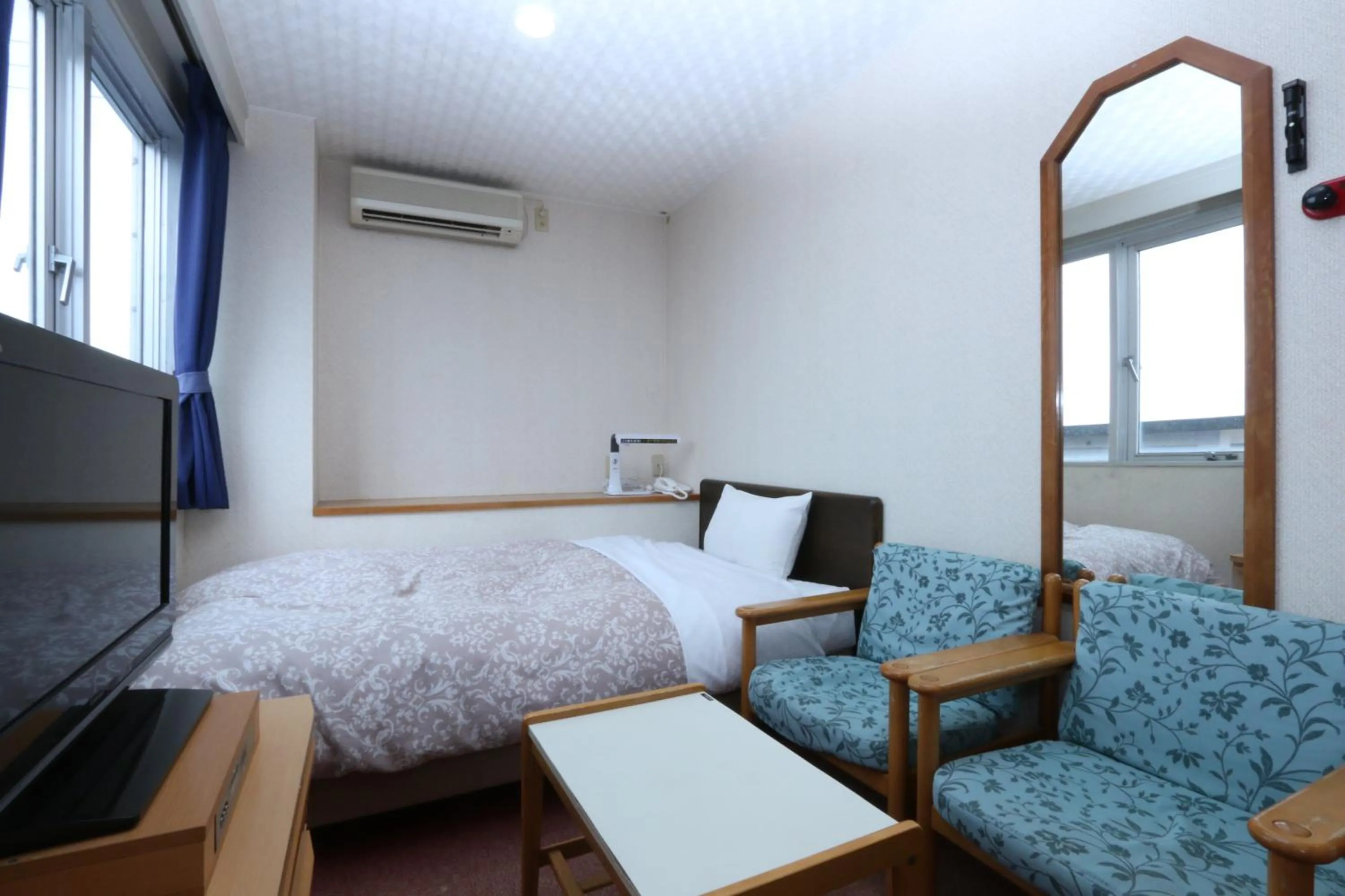 Bed in Hotel Auberge