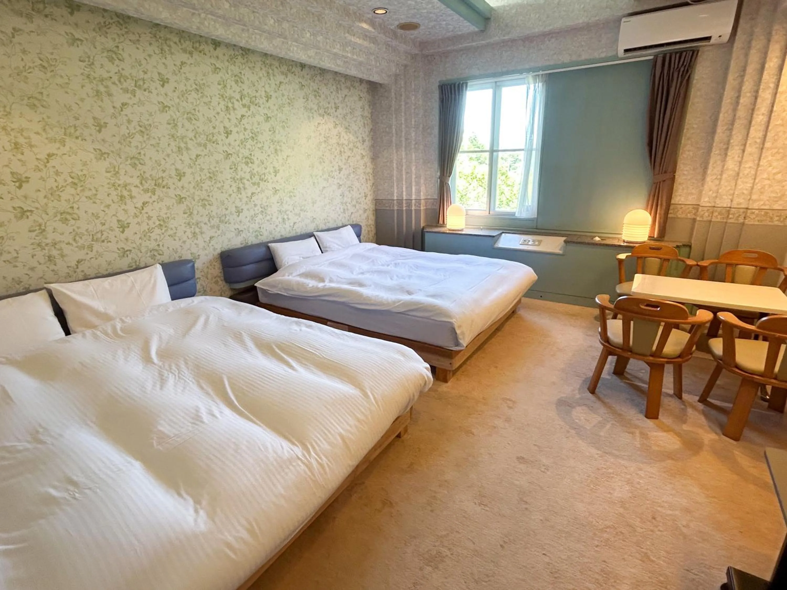 Bed in Farm Garden Hotel