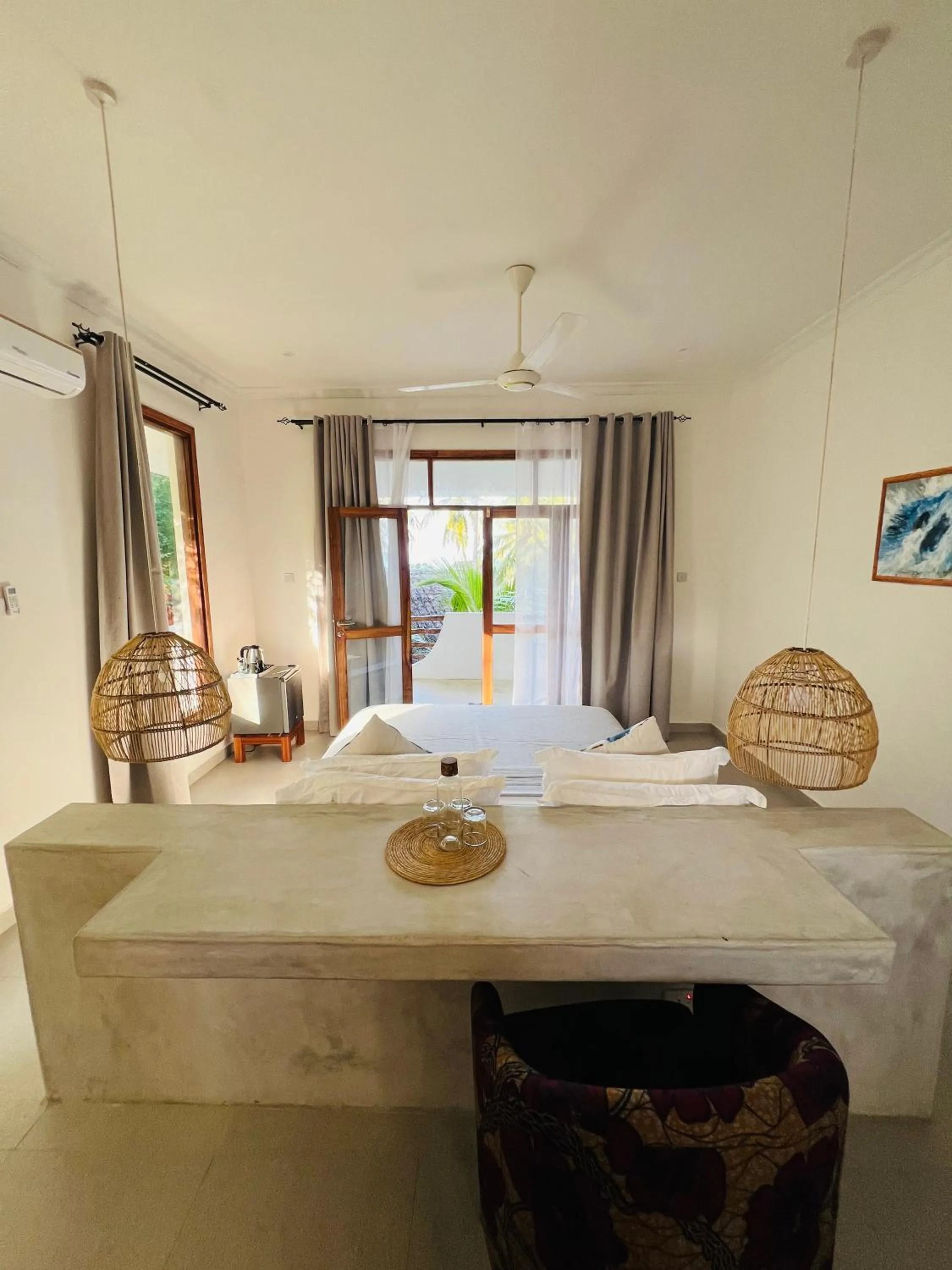 Bed in Mnana Beach Bungalows