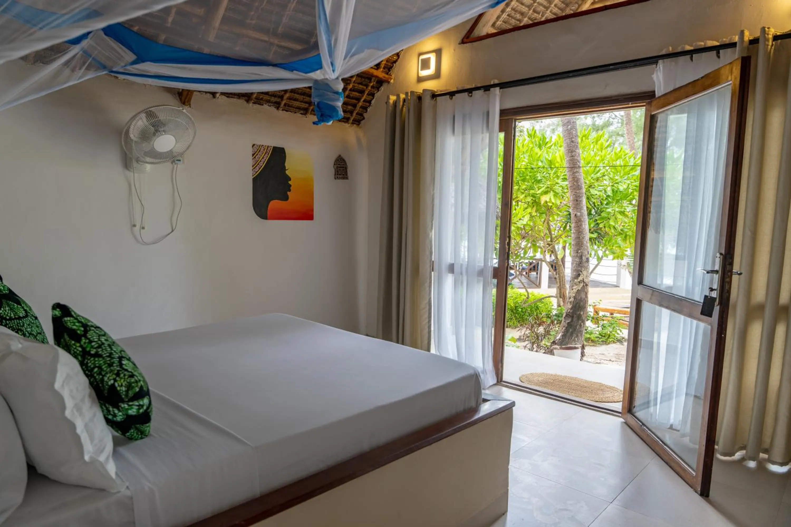 View (from property/room), Bed in Mnana Beach Bungalows