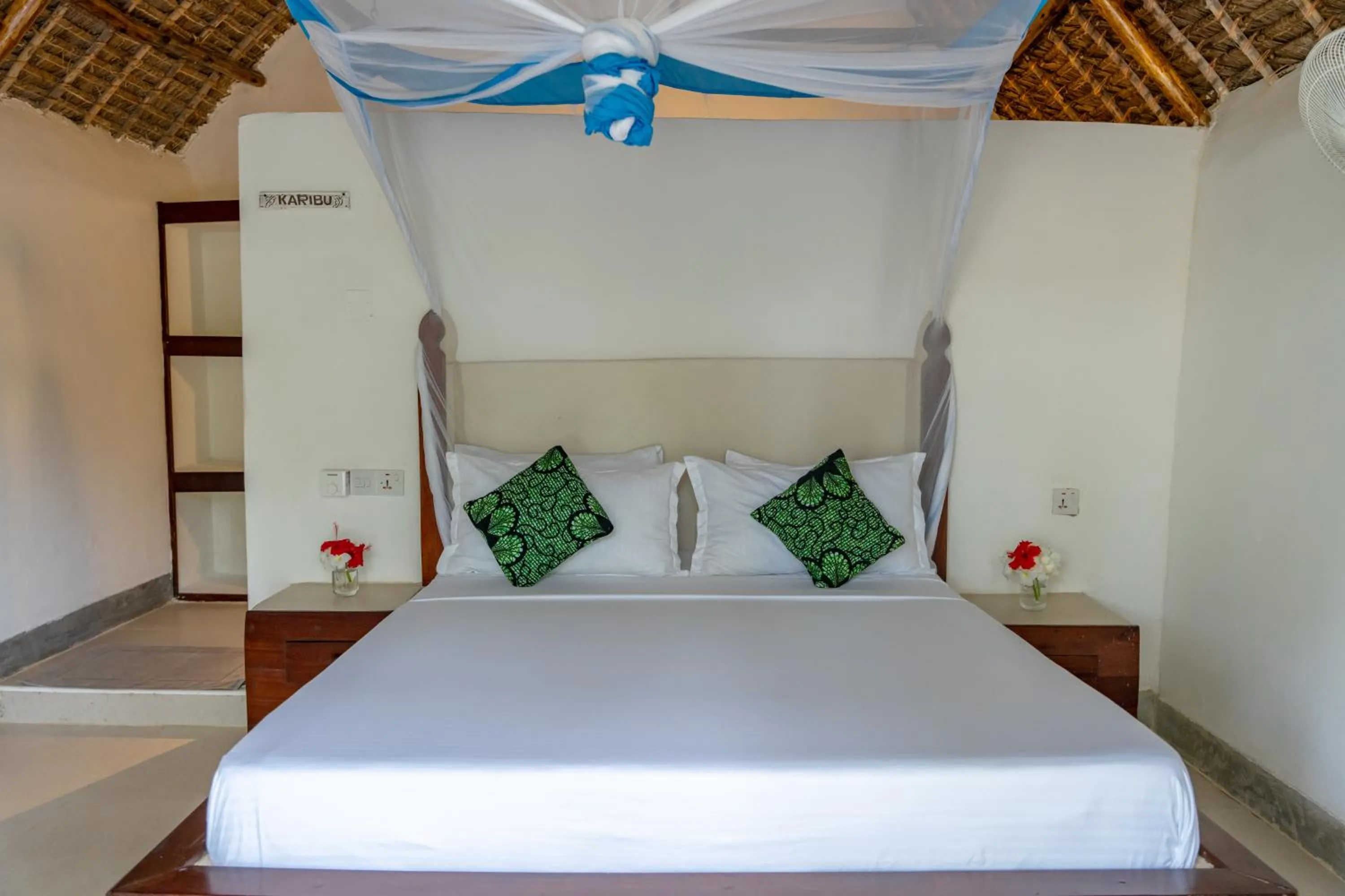 Bed in Mnana Beach Bungalows