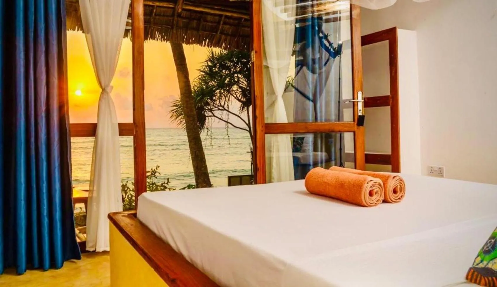 Bed in Mnana Beach Bungalows