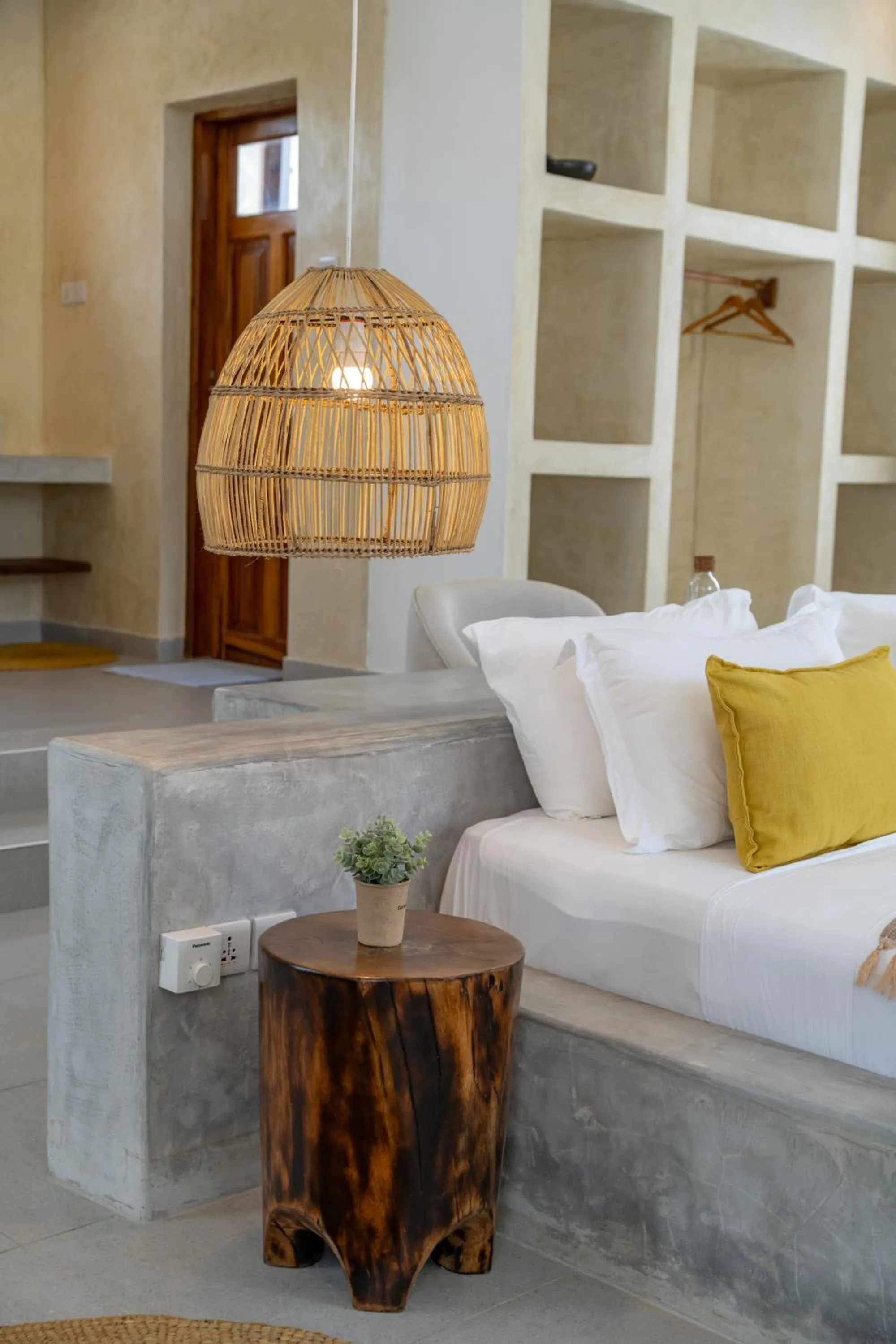 Bed in Mnana Beach Bungalows