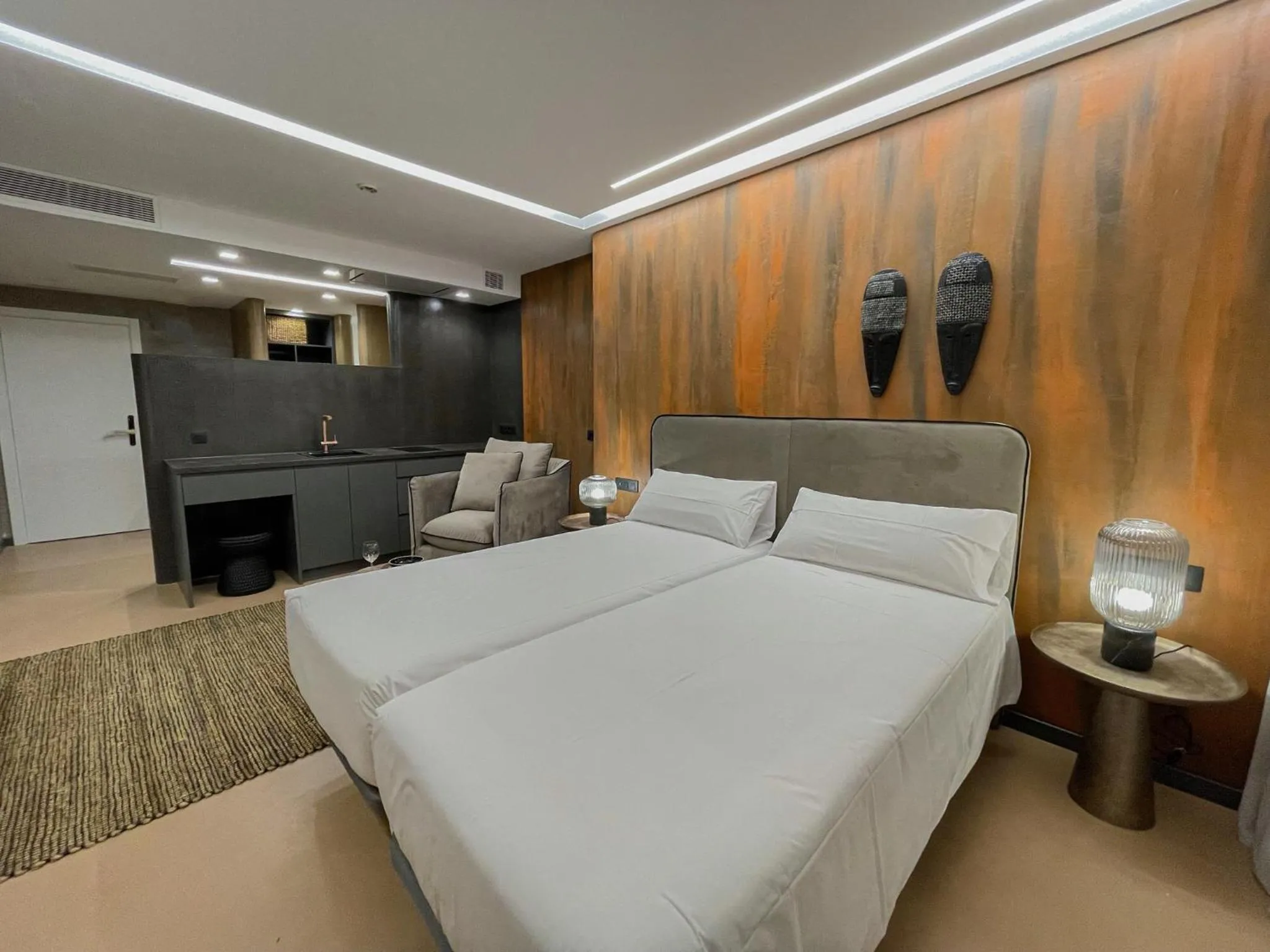 Bed in Gran Marina Suites