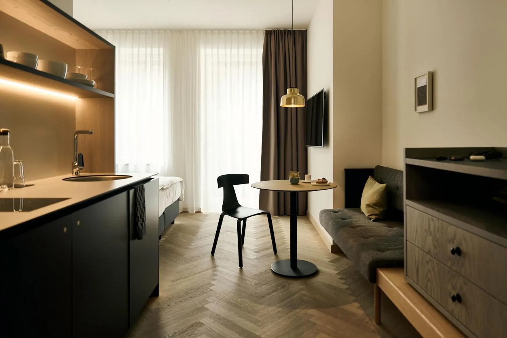 Kitchen or kitchenette in Melter Hotel & Apartments - a Neighborhood Hotel