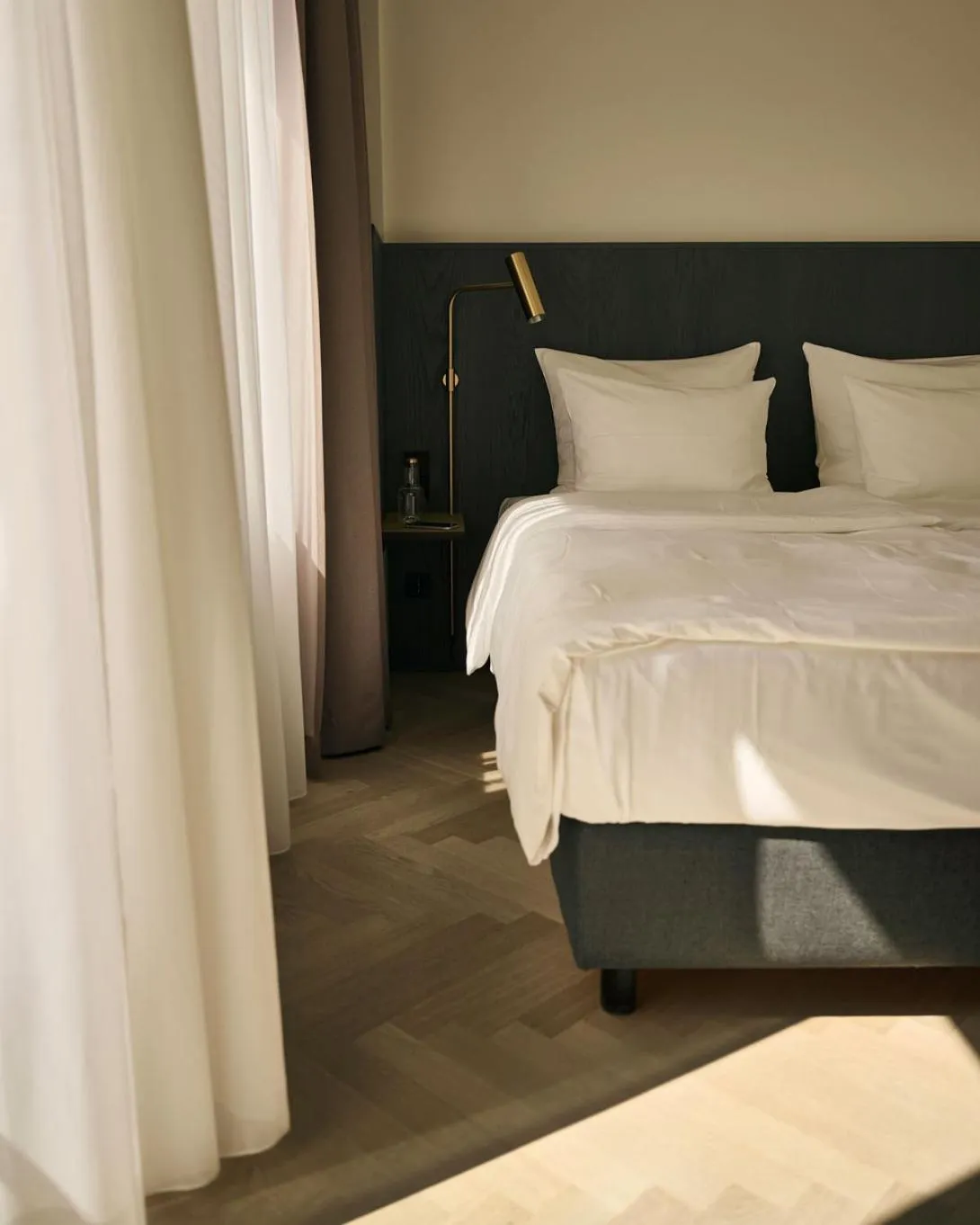 Bed in Melter Hotel & Apartments - a Neighborhood Hotel