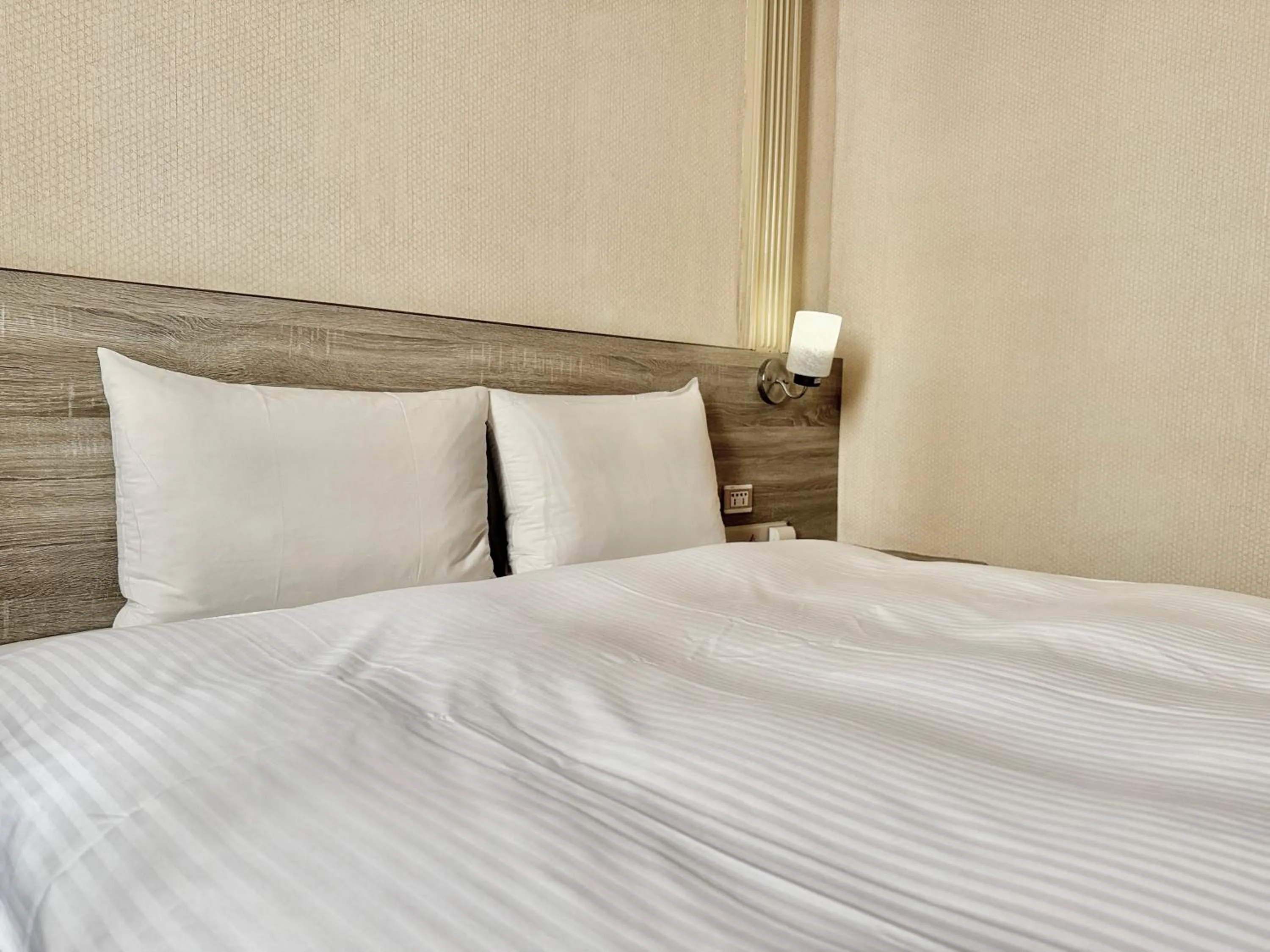 Bed in WL HOTEL Hsinchu