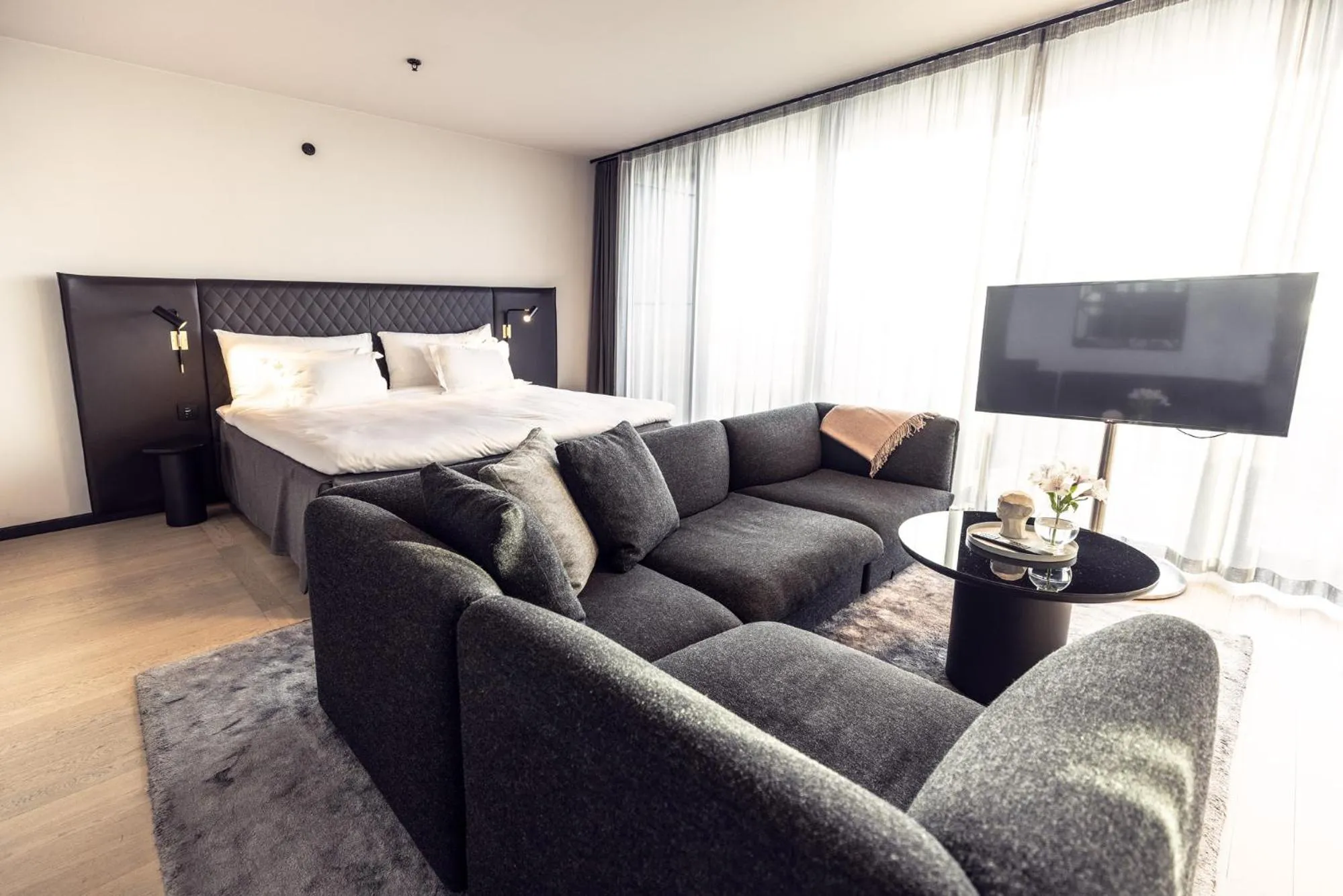 Photo of the whole room, Bed in At Six