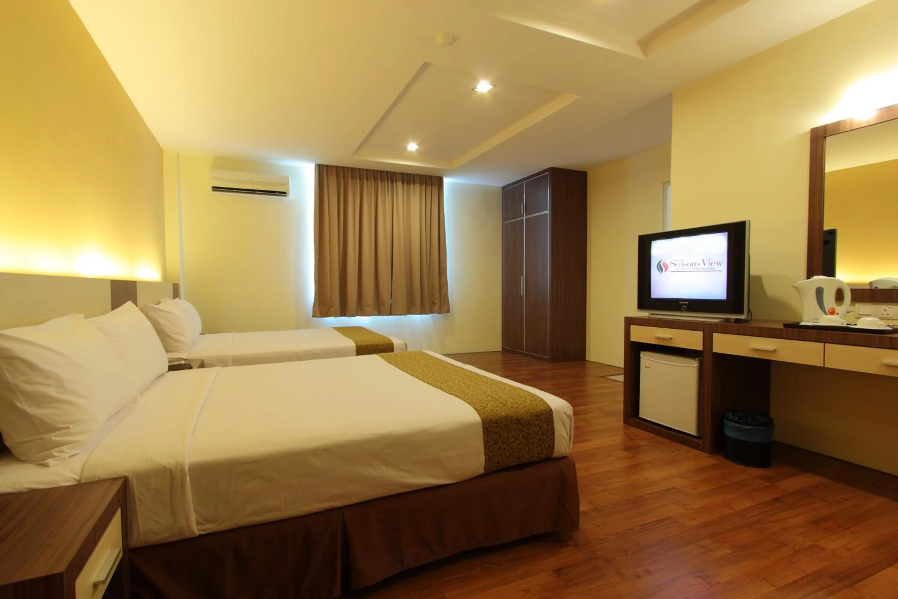 Bed in Seasons View Hotel