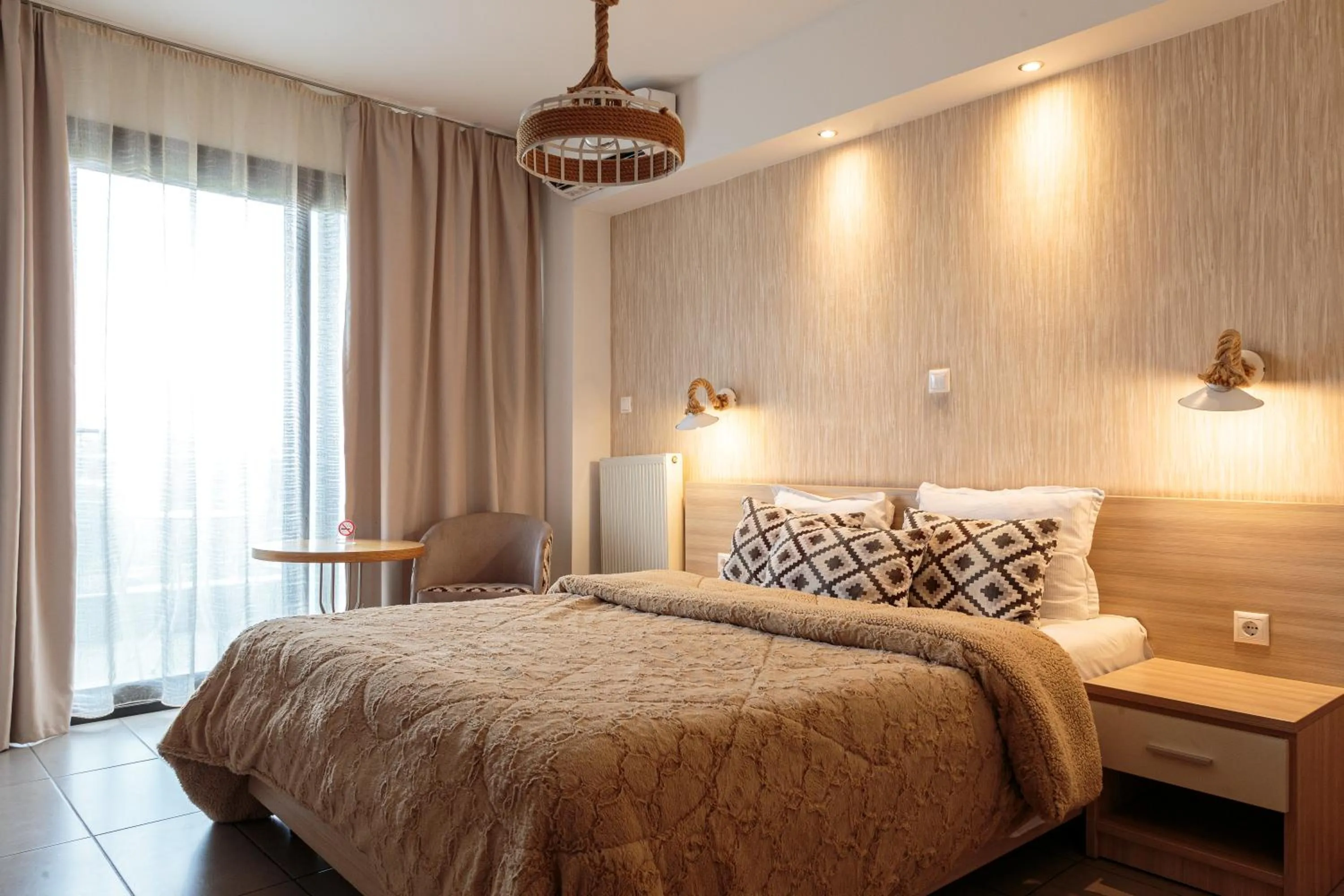 Bed in Limani Comfort Rooms