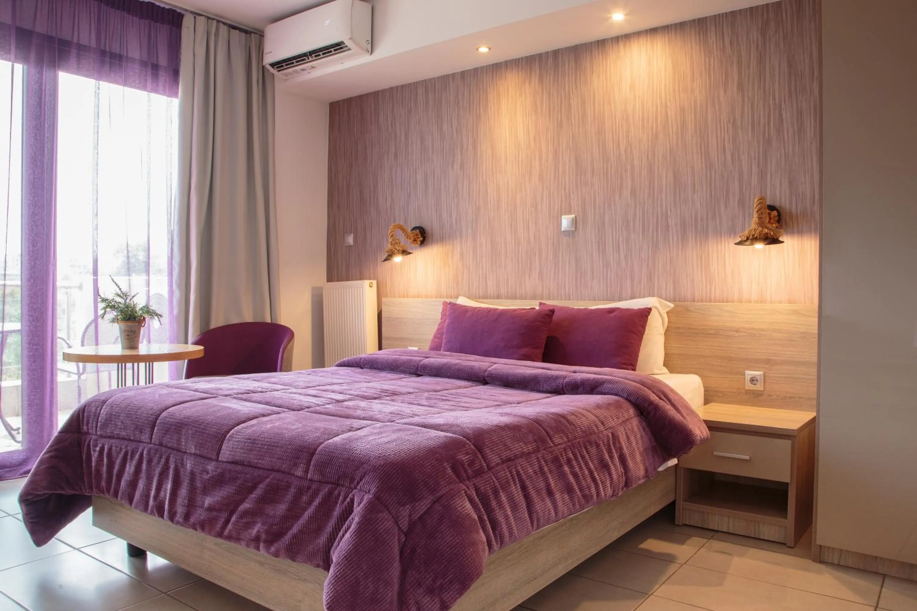 Bed in Limani Comfort Rooms