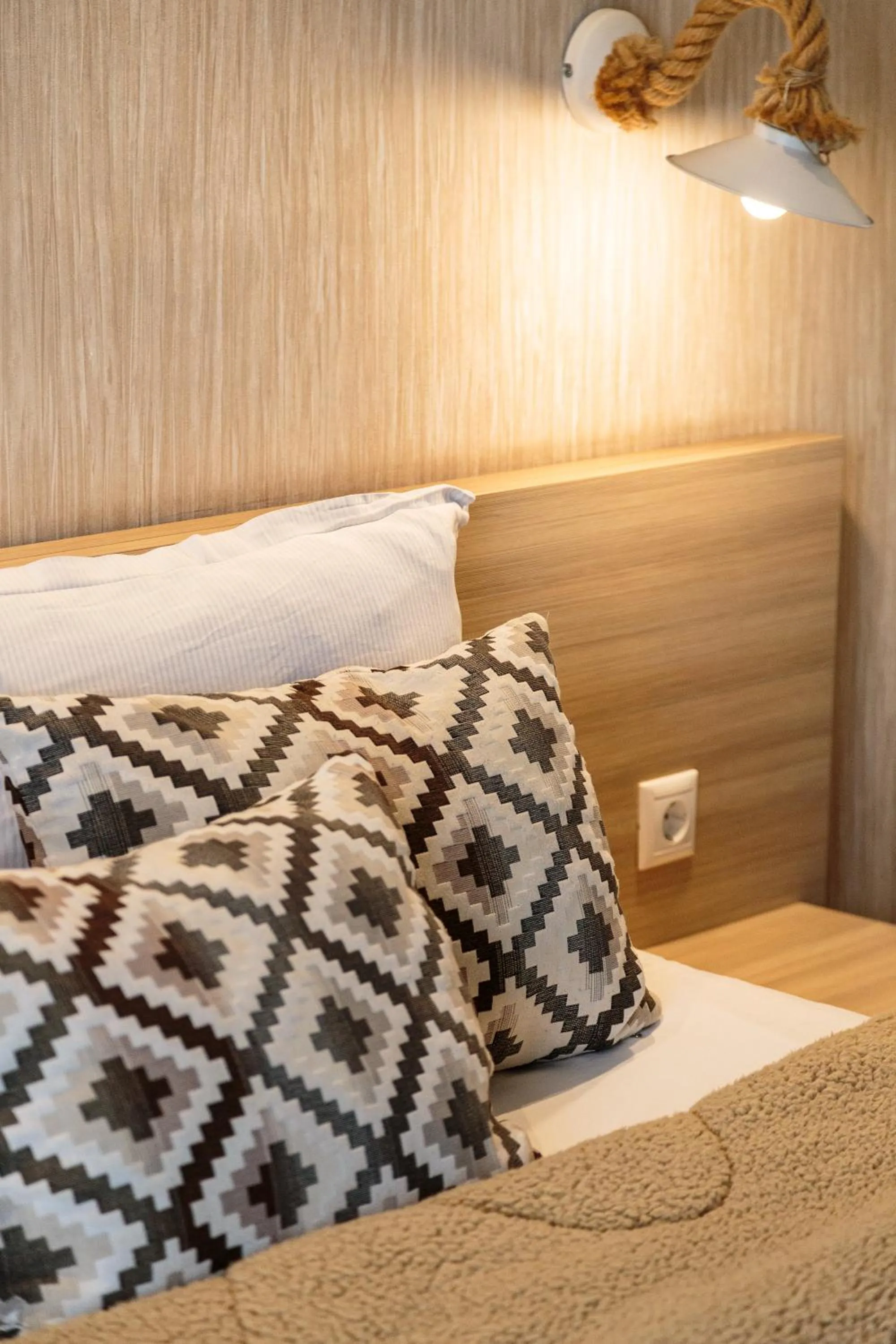 Bed in Limani Comfort Rooms