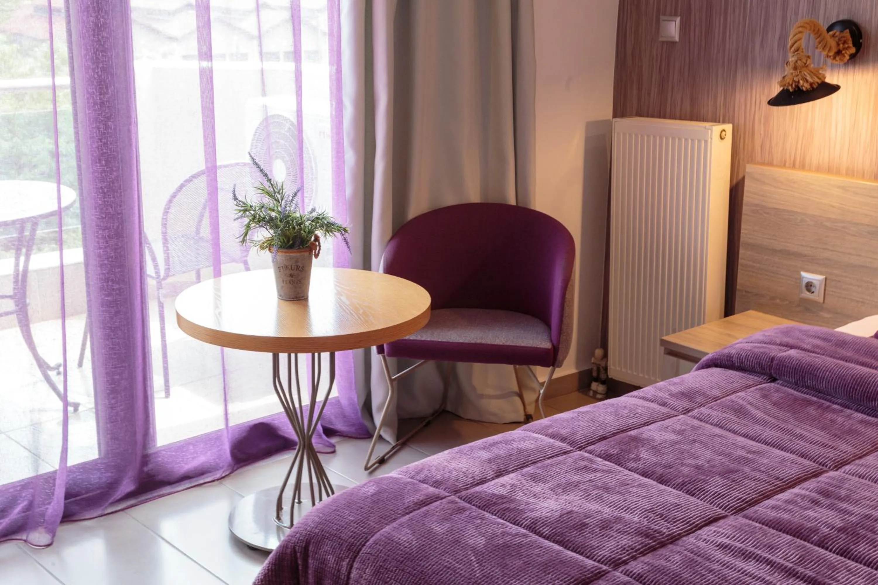 Bed in Limani Comfort Rooms