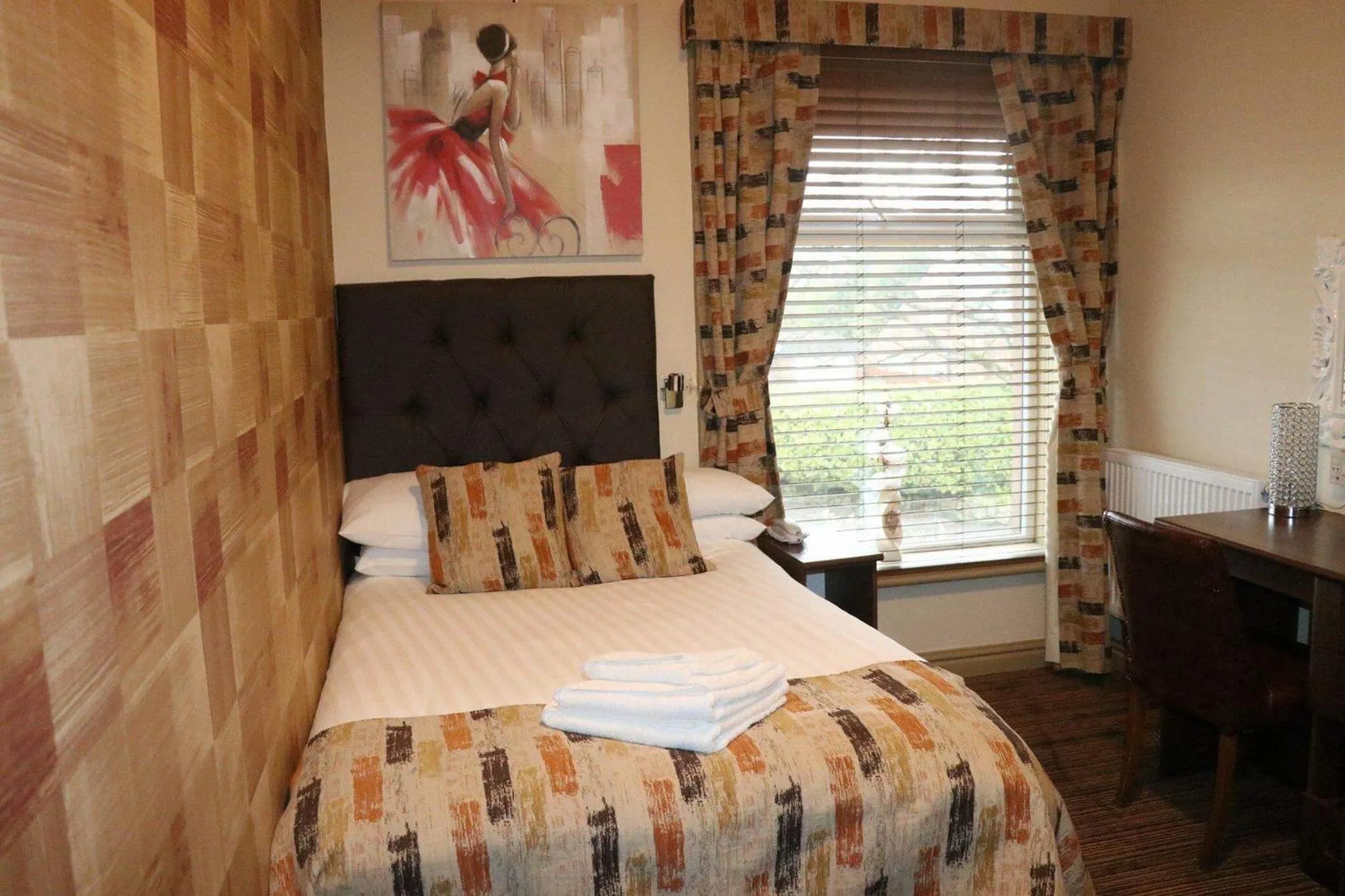 Bed in The Griffin Inn