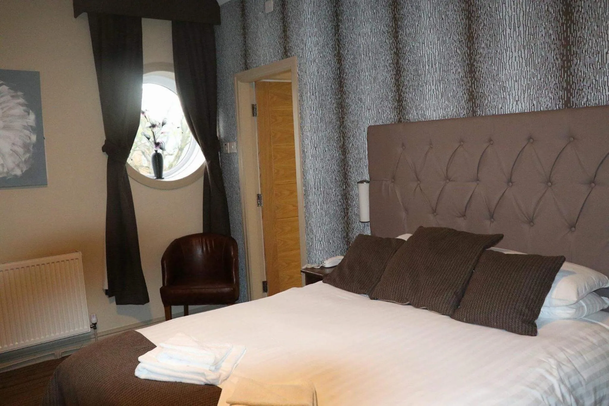 Bed in The Griffin Inn