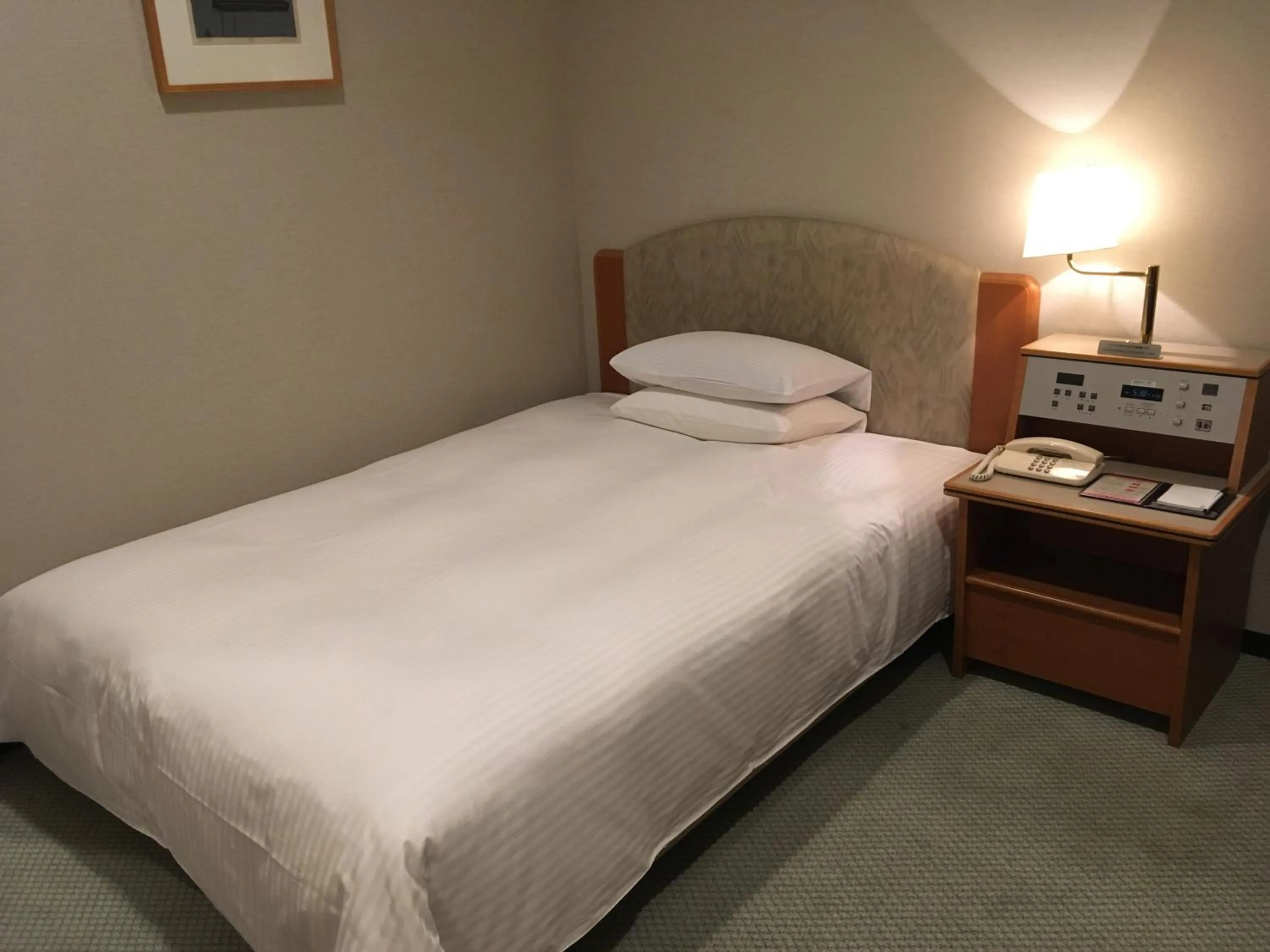 Bed in Keihanna Plaza Hotel