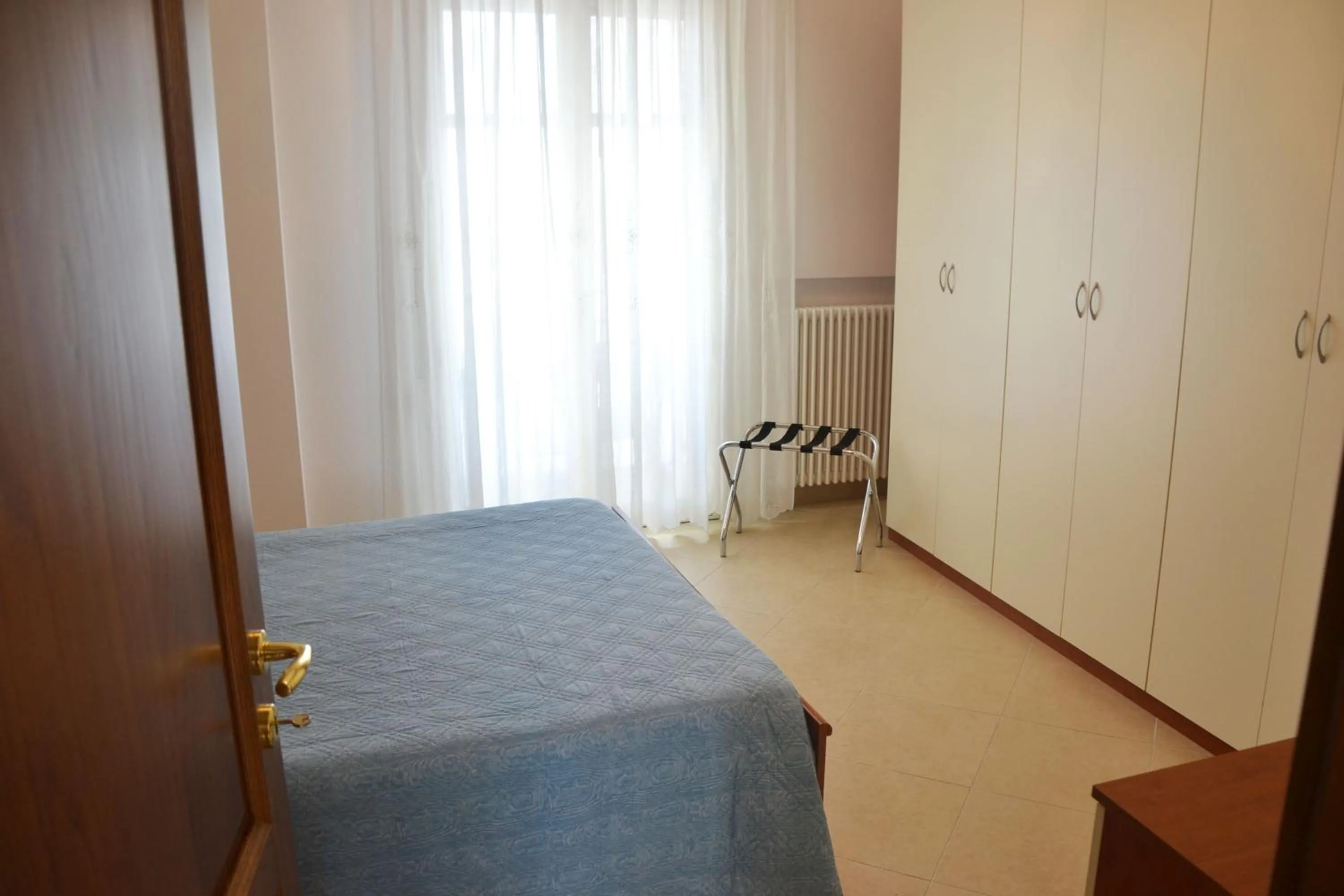 Photo of the whole room in B&B La Regina di Rimini