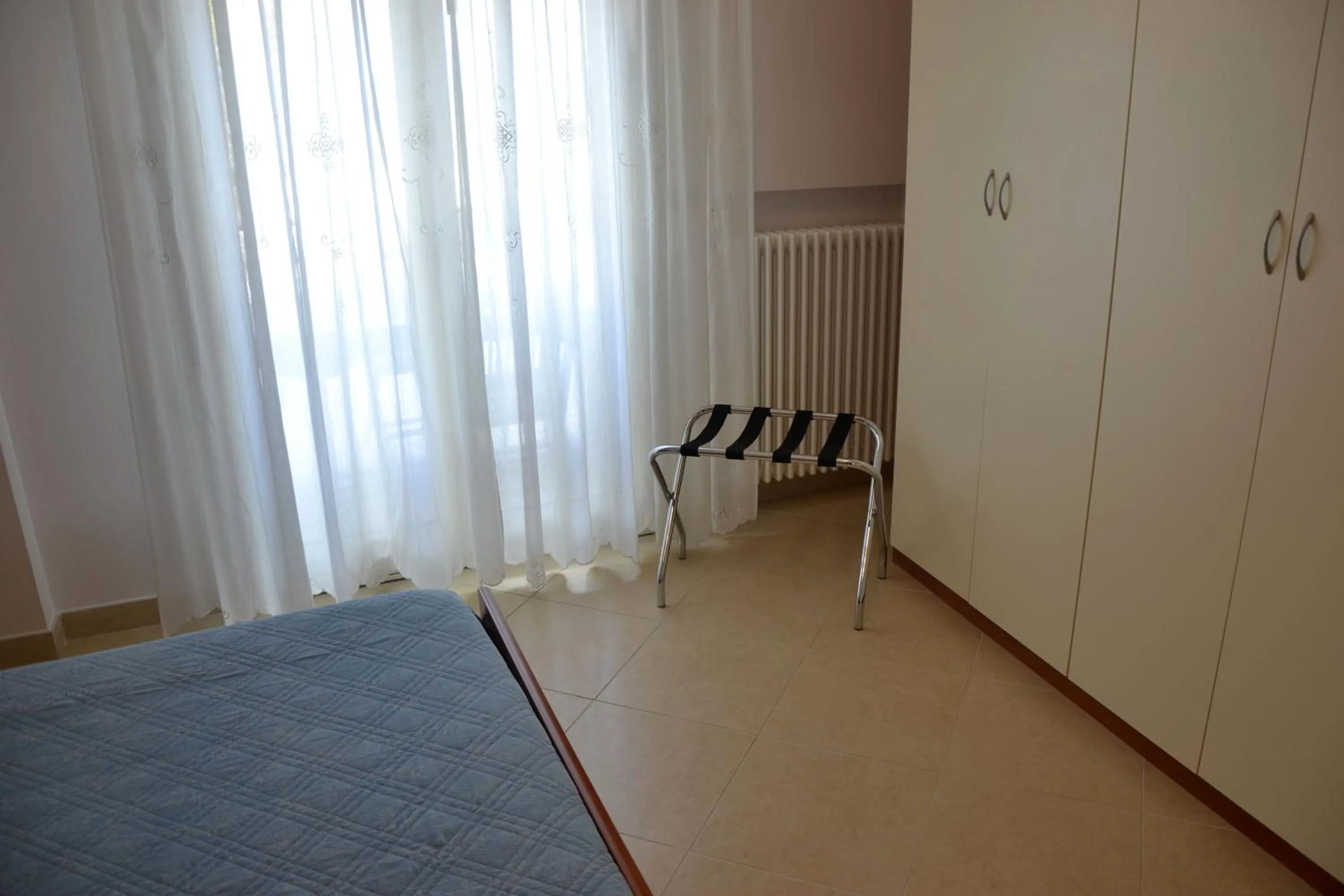 Photo of the whole room in B&B La Regina di Rimini
