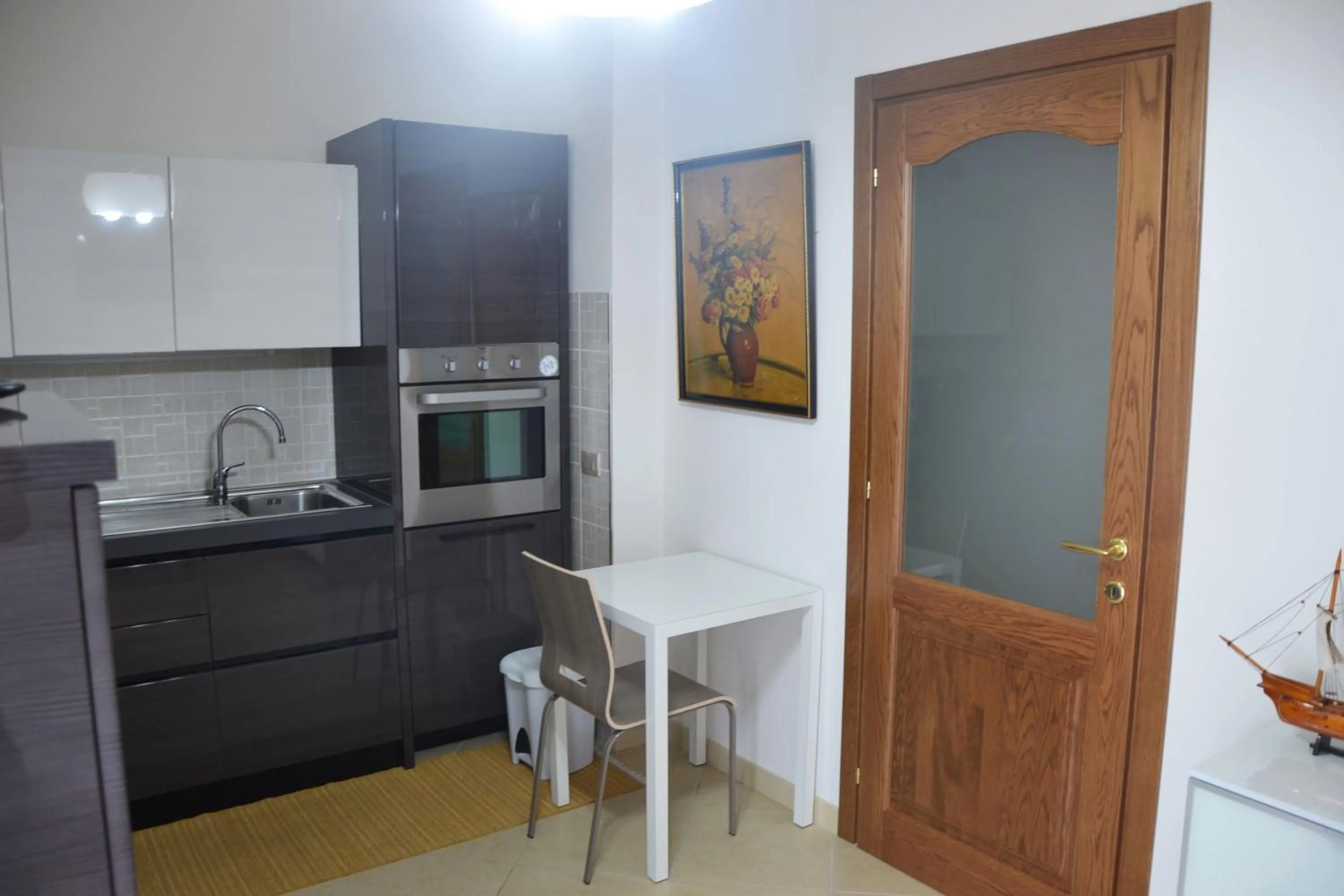 Communal kitchen in B&B La Regina di Rimini