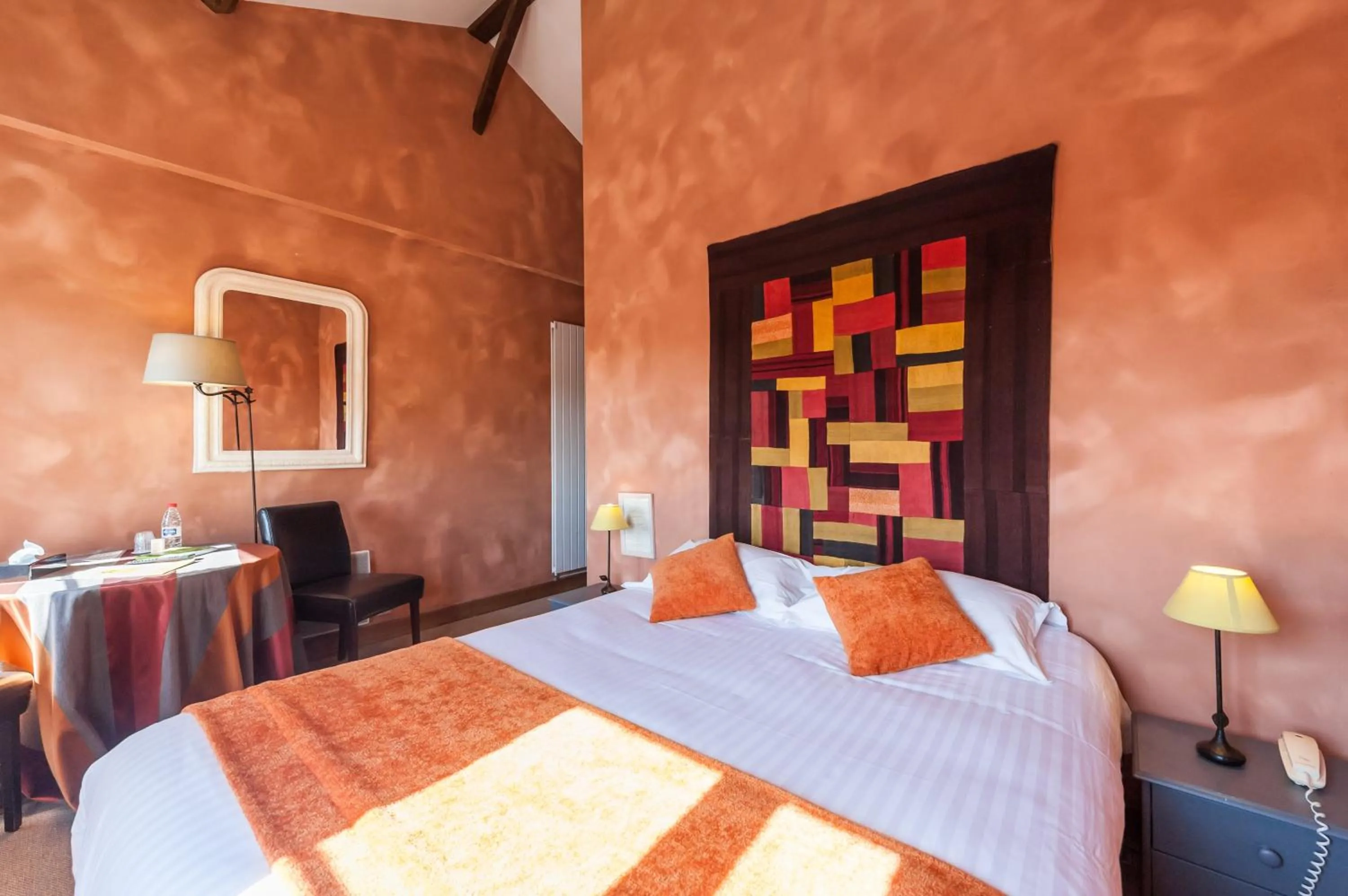 Bed in Logis hotels Les Glycines