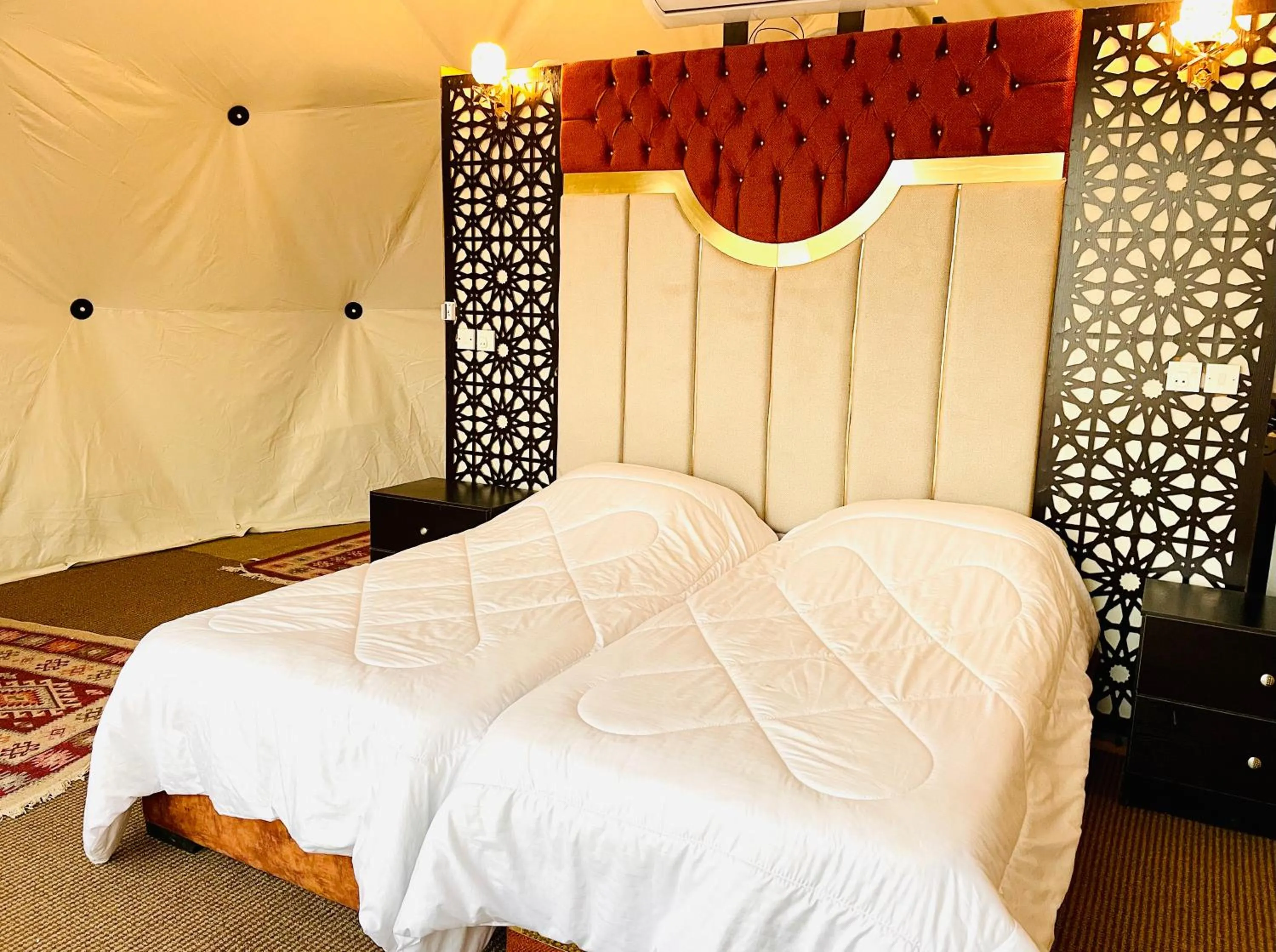 Bed in Hasan Zawaideh luxury camp 2