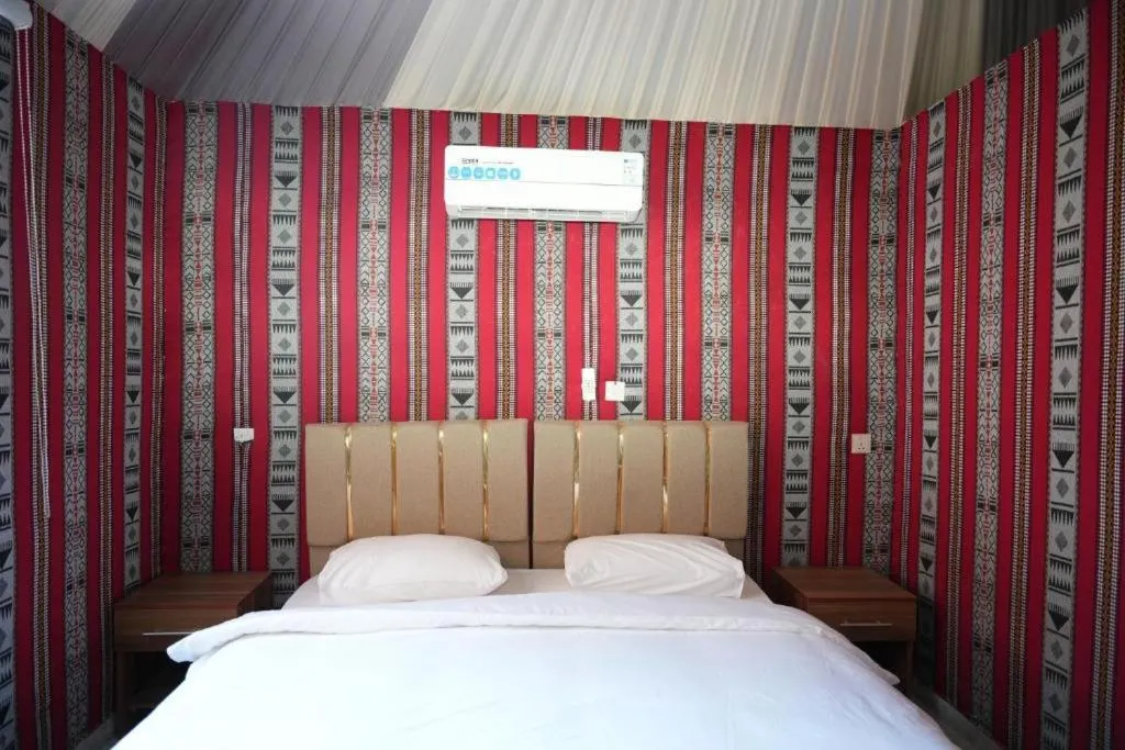 Bed in Hasan Zawaideh luxury camp 2