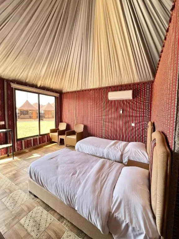 Bed in Hasan Zawaideh luxury camp 2