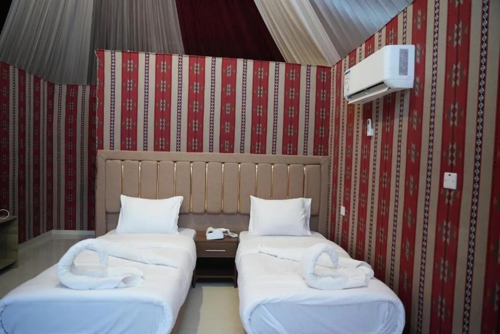 Bed in Hasan Zawaideh luxury camp 2