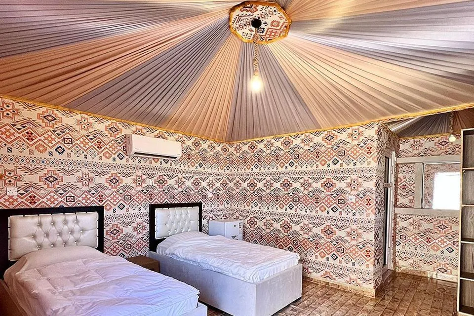 Bed in Hasan Zawaideh luxury camp 2