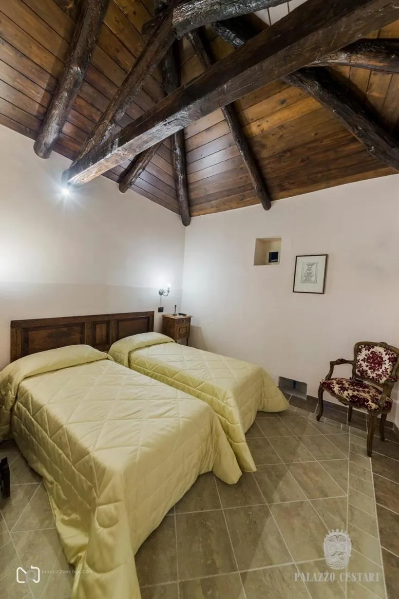 Bed in Palazzo Cestari Hotel