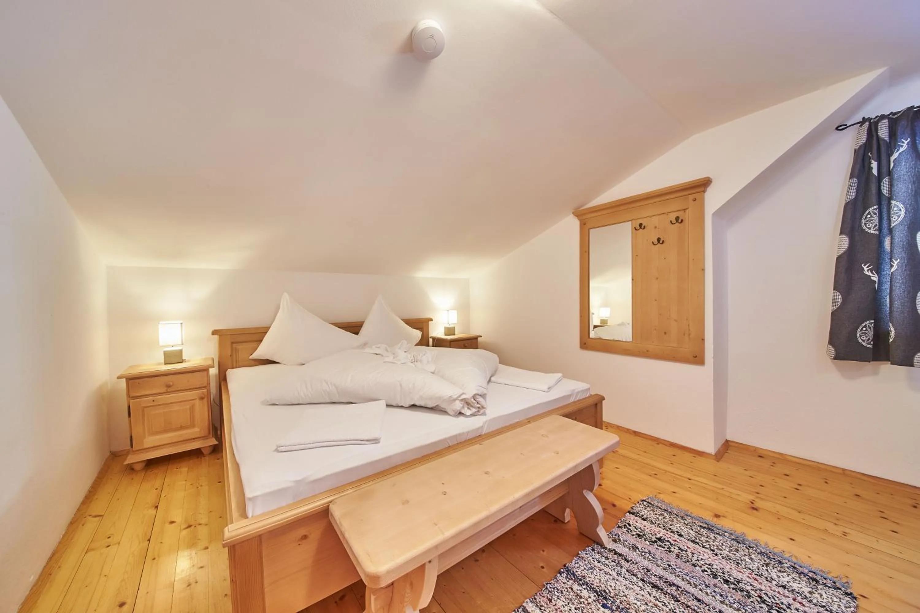 Bed in Ferienhaus Oberlengau