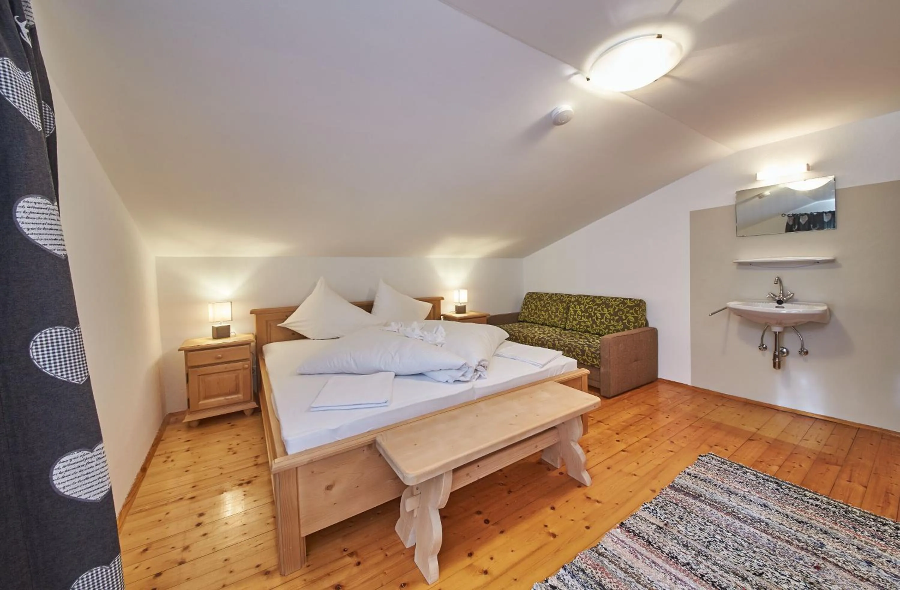 Bed in Ferienhaus Oberlengau