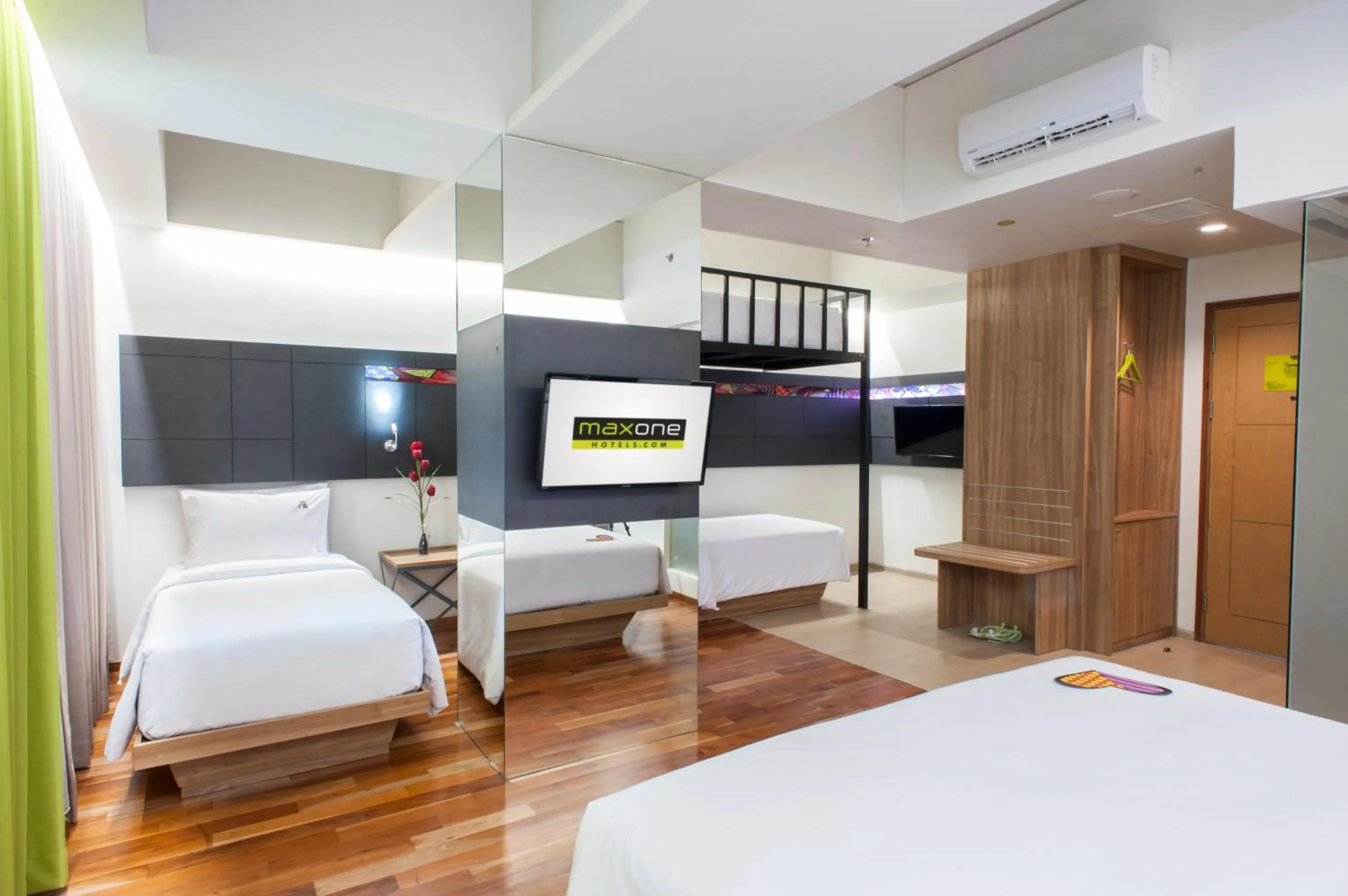 Bed in MaxOneHotels at Dharmahusada Surabaya