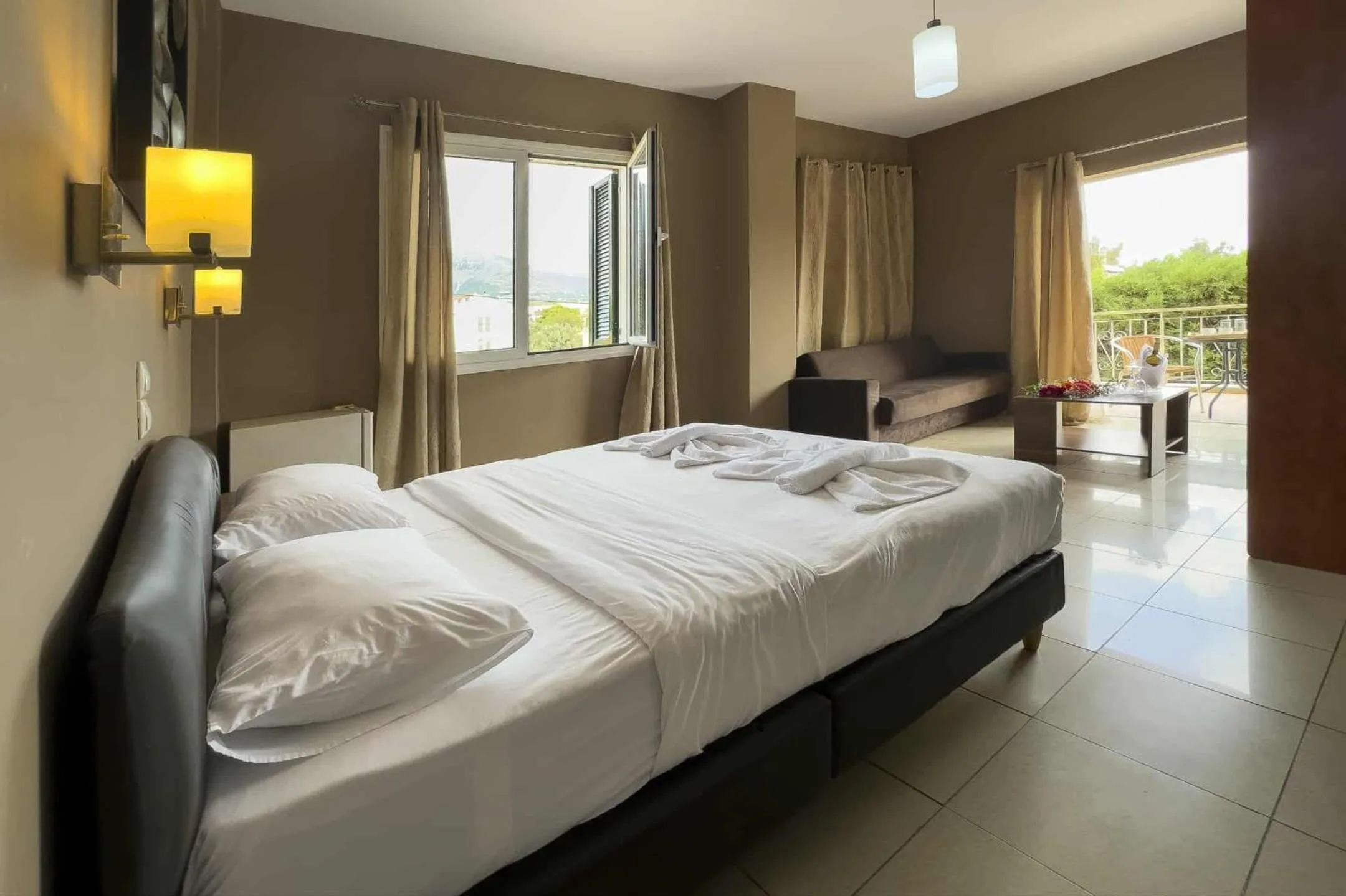 Bed in Cavallari Palace Hotel Suites