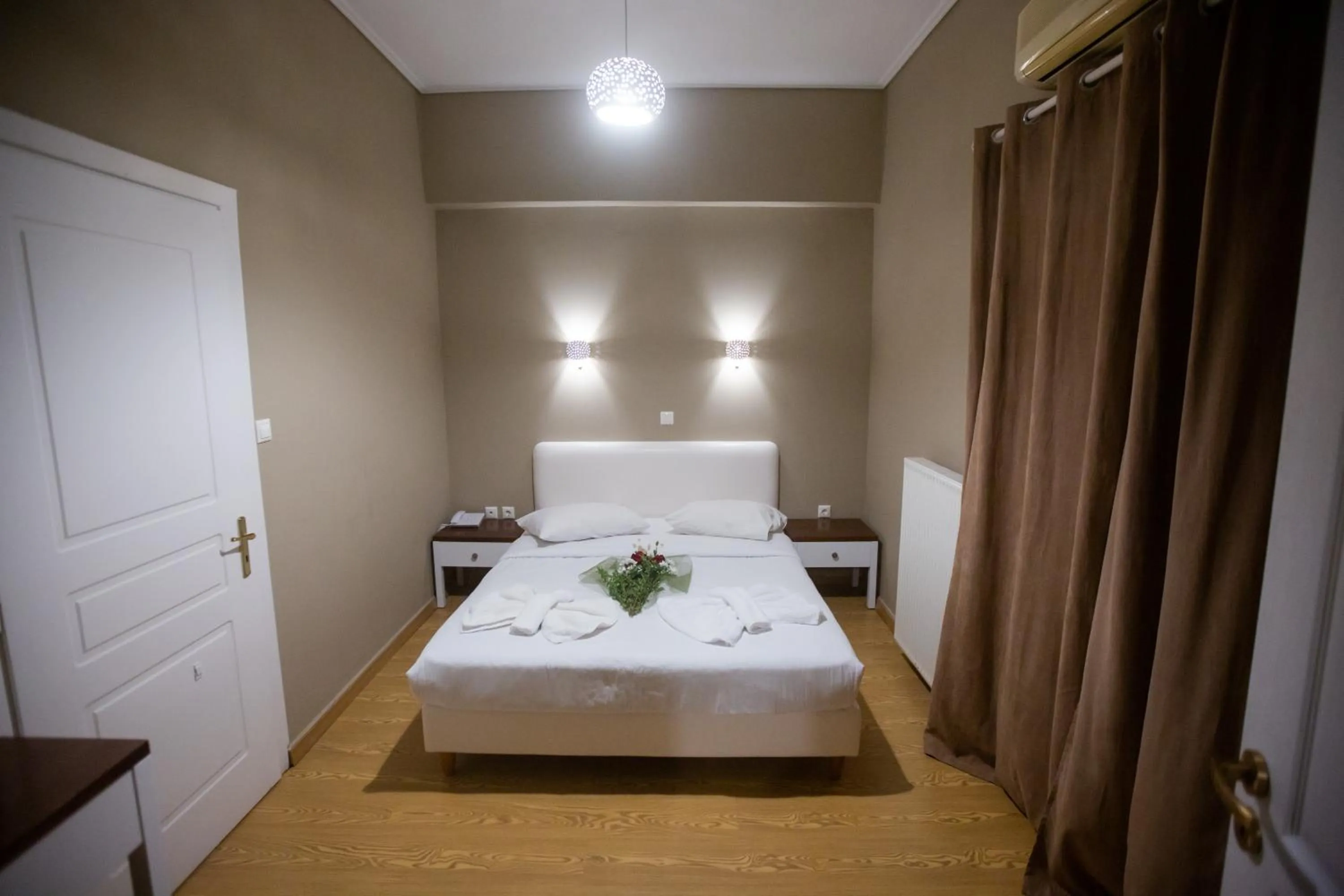 Bed in Cavallari Palace Hotel Suites