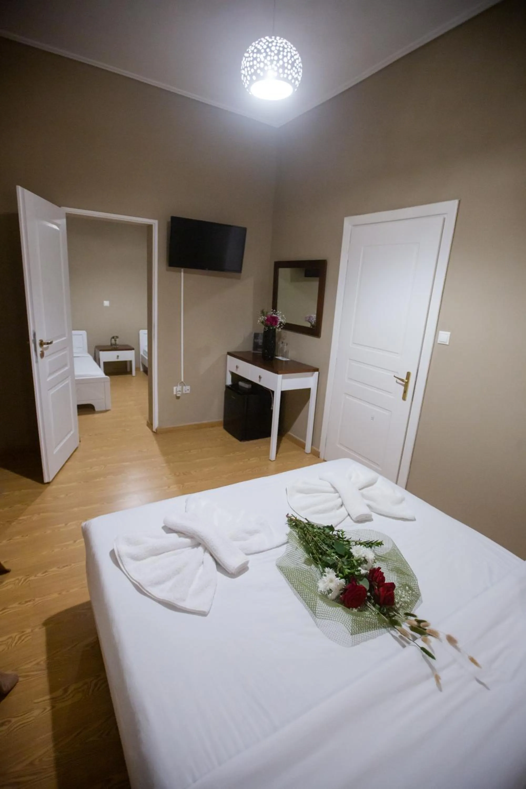 Bed in Cavallari Palace Hotel Suites