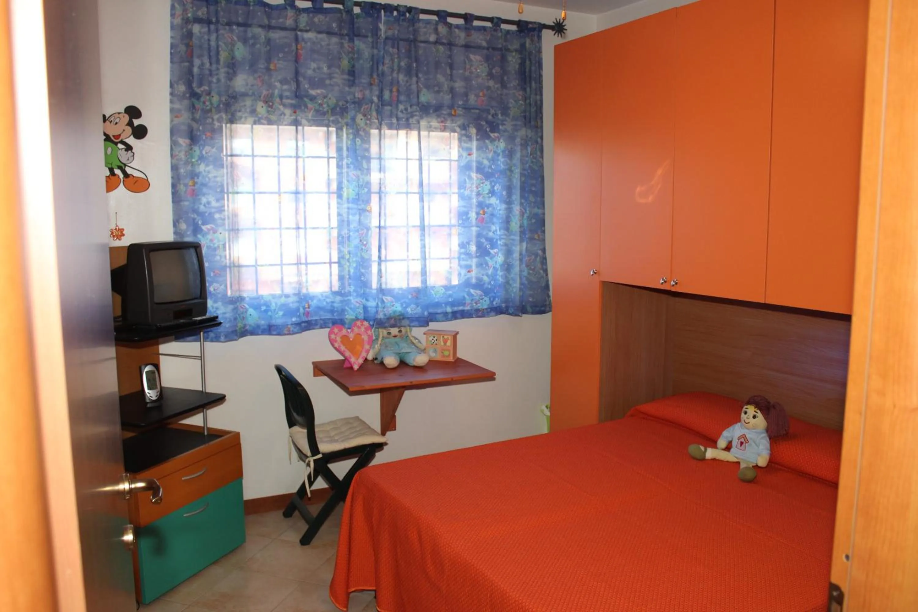 Photo of the whole room, Bed in Casina Carina Carina