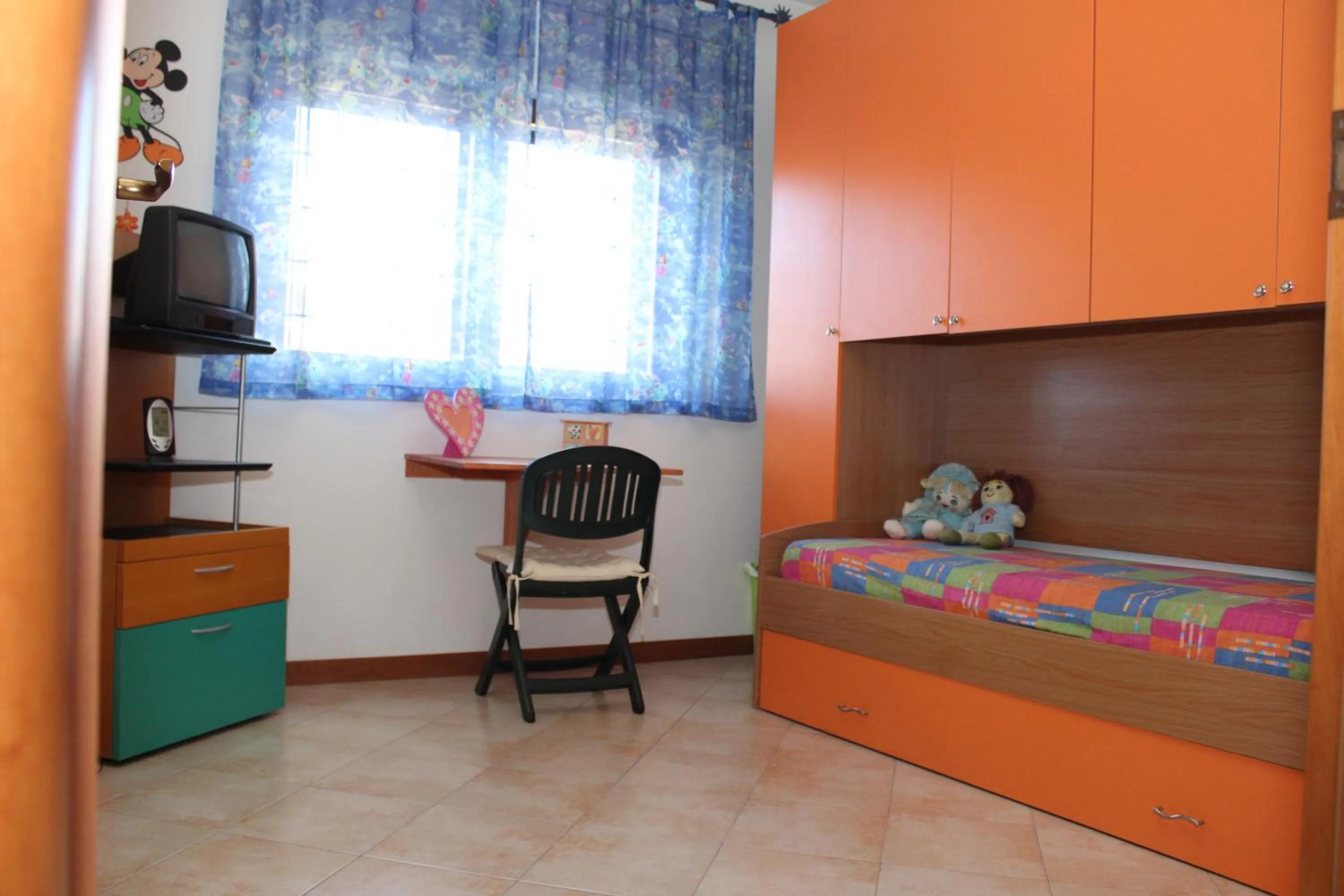 Photo of the whole room, Bed in Casina Carina Carina