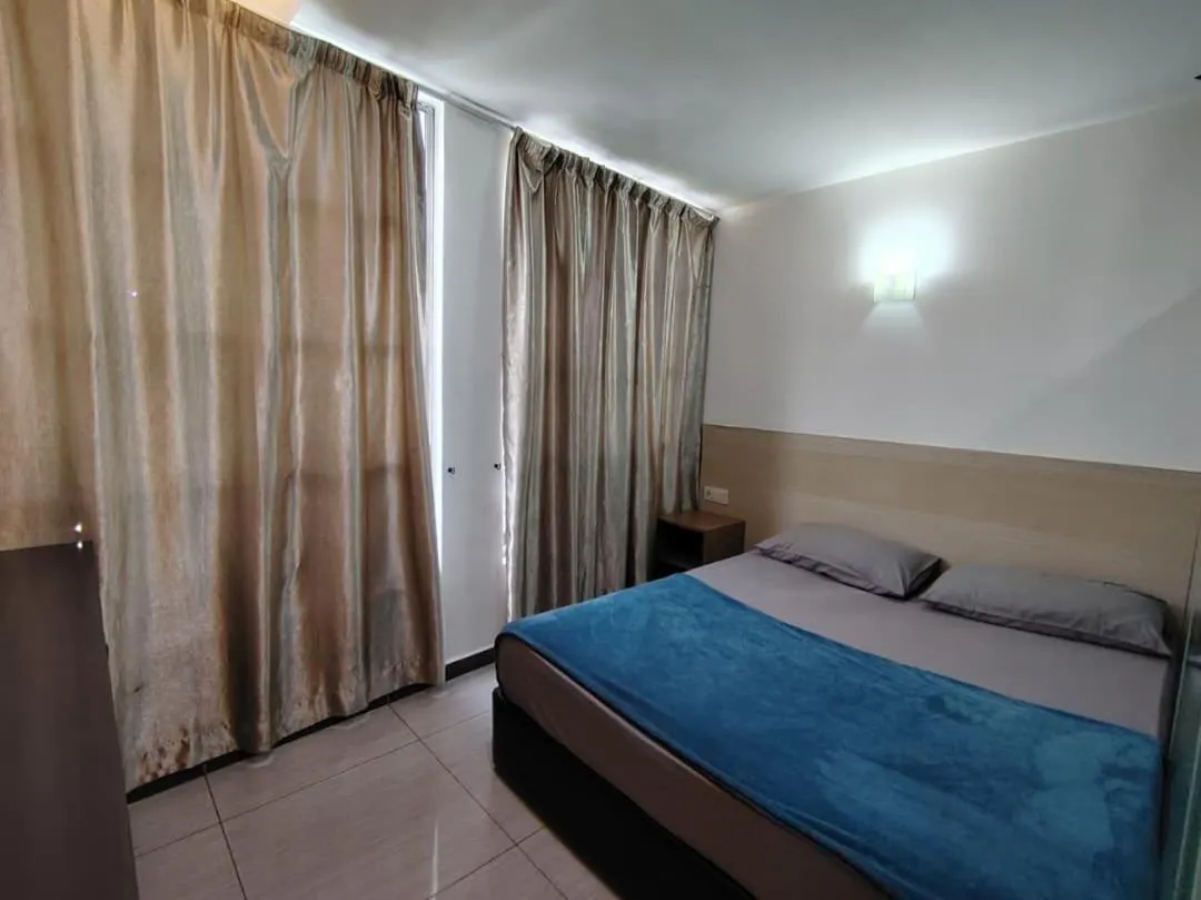 Bed in Dolphin Hotel