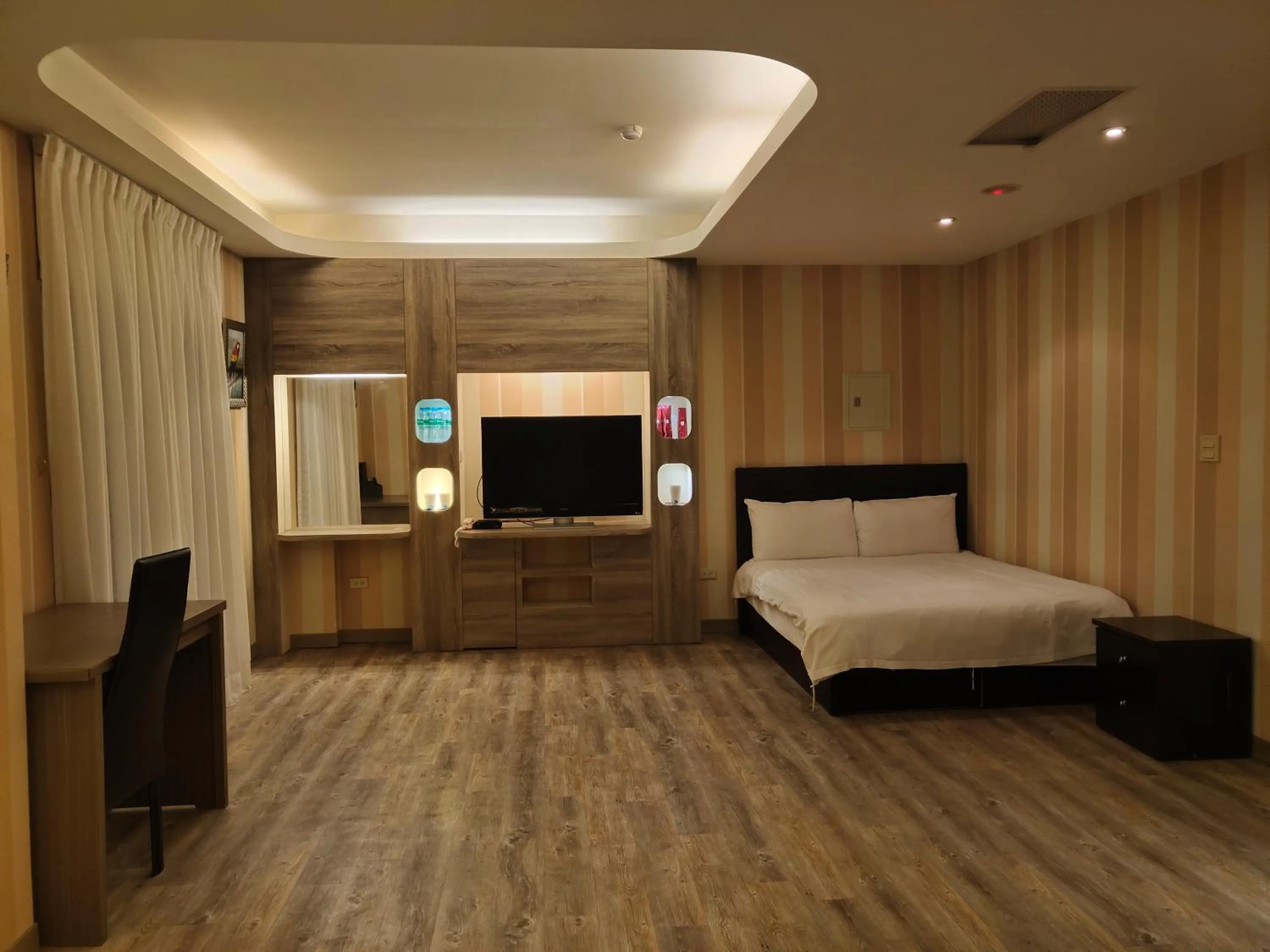 Bed in Empire Pacific Hotel龍潭科學園區 六福村 幼獅工業園區 長租旅居