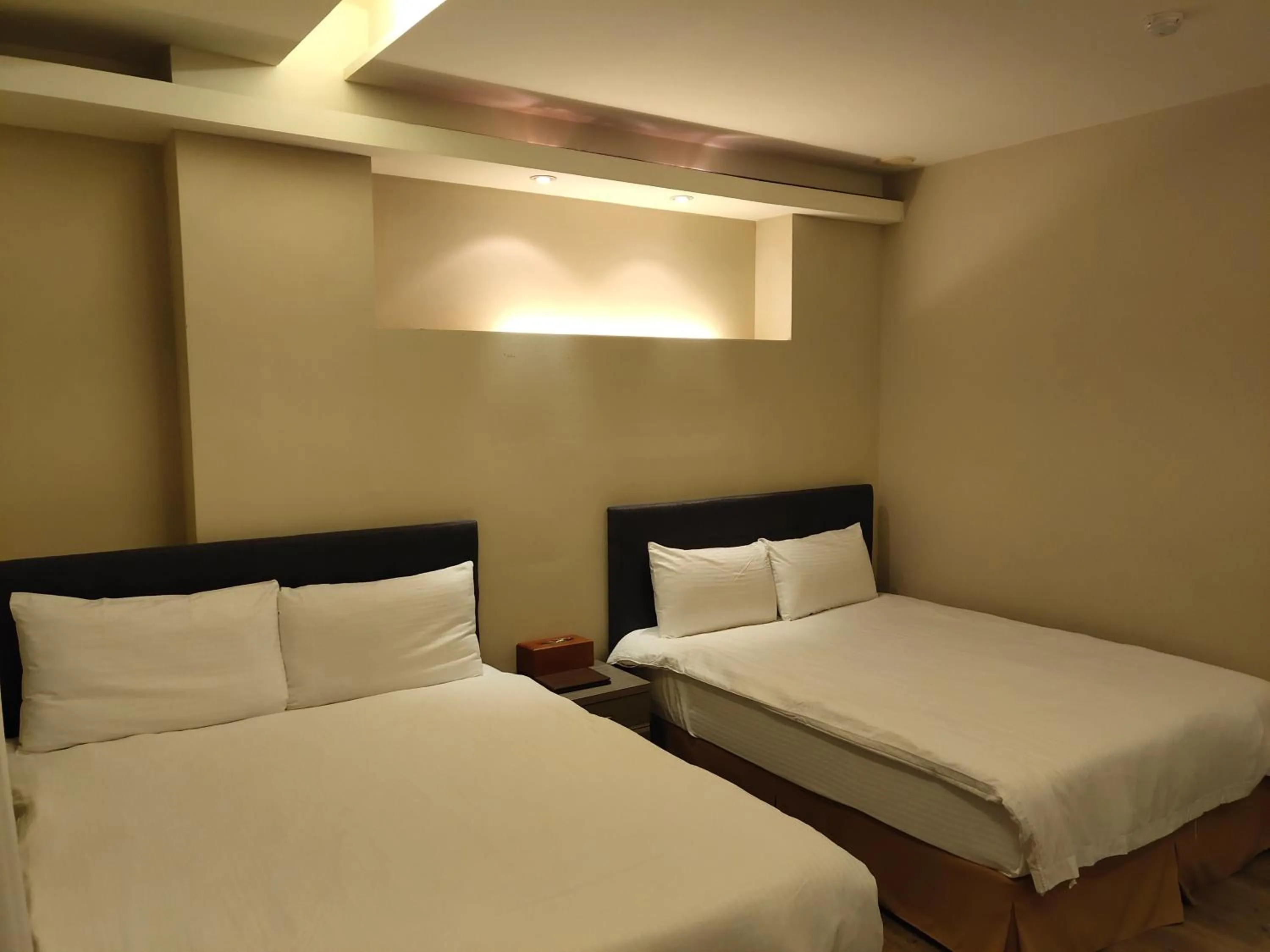 Bed in Empire Pacific Hotel龍潭科學園區 六福村 幼獅工業園區 長租旅居