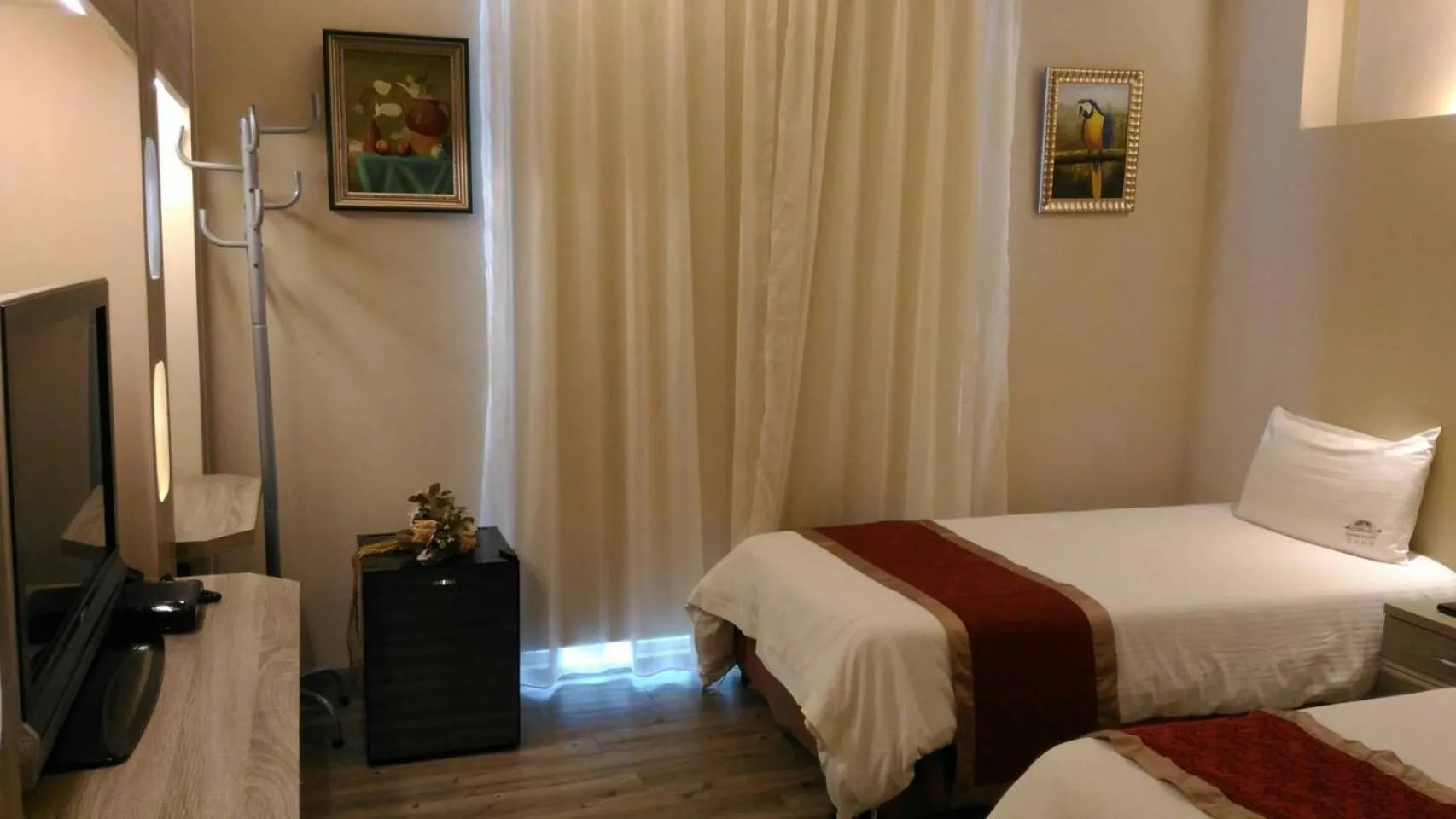 Bed in Empire Pacific Hotel龍潭科學園區 六福村 幼獅工業園區 長租旅居