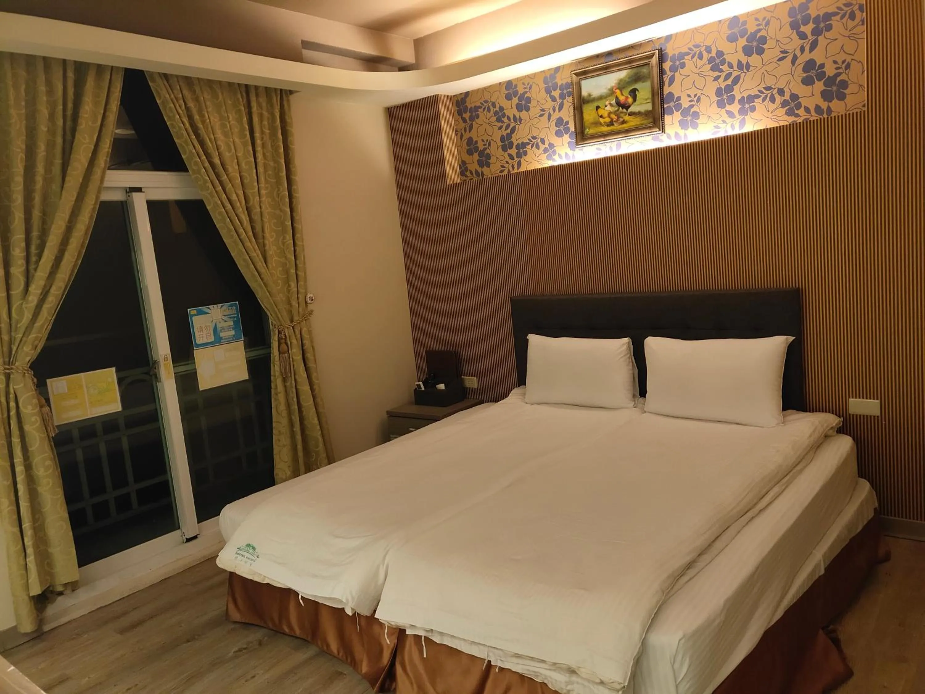 Bed in Empire Pacific Hotel龍潭科學園區 六福村 幼獅工業園區 長租旅居