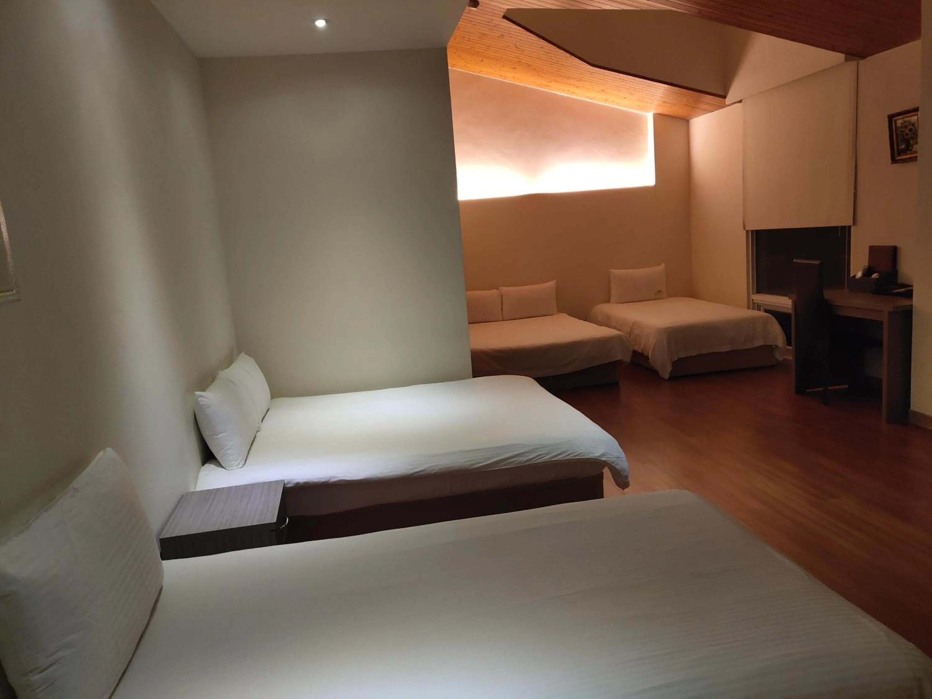 Bed in Empire Pacific Hotel龍潭科學園區 六福村 幼獅工業園區 長租旅居